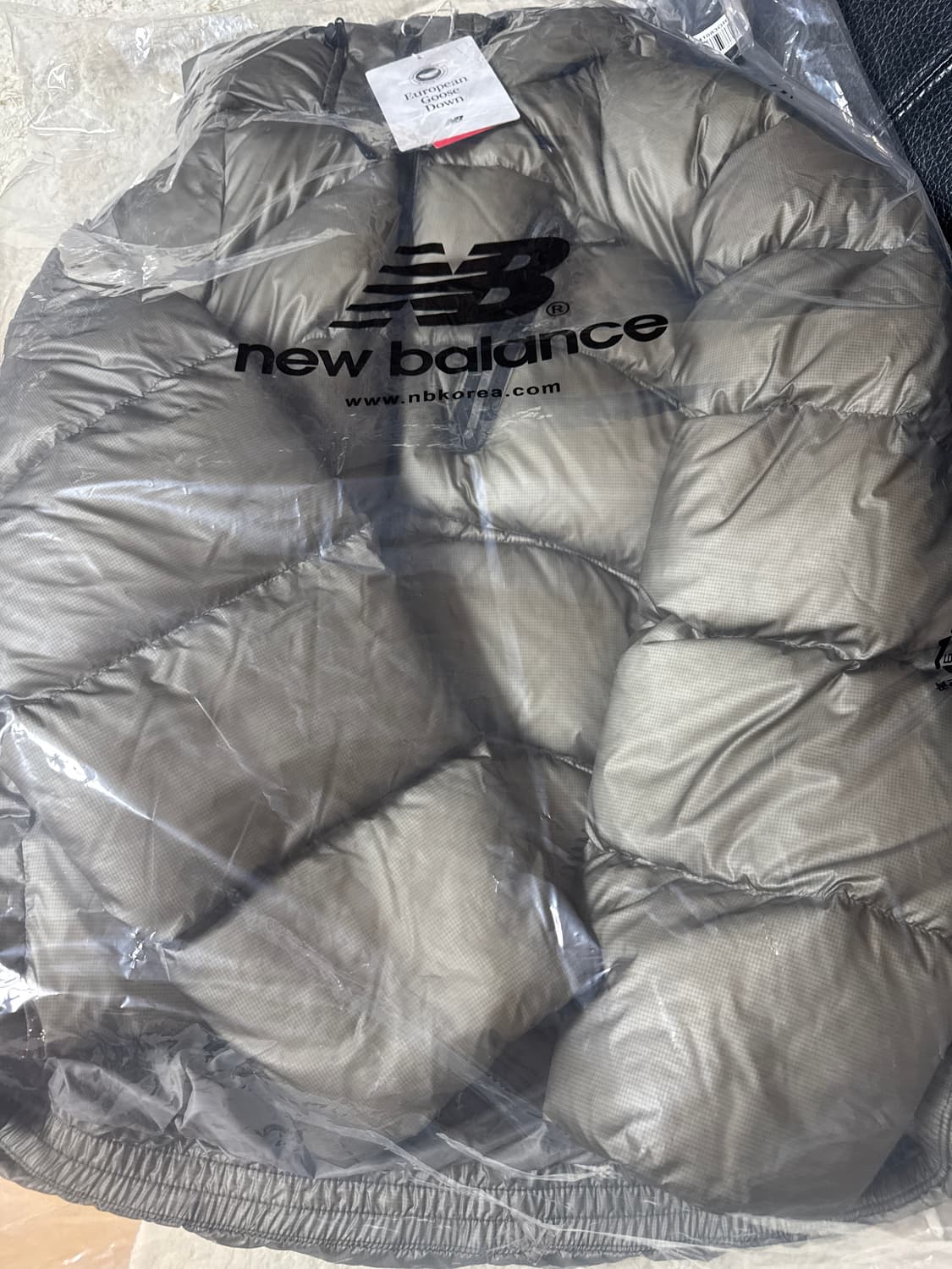 뉴발란스 플라잉77 슈퍼라이트 후드형 헤비 구스다운  상품이미지1