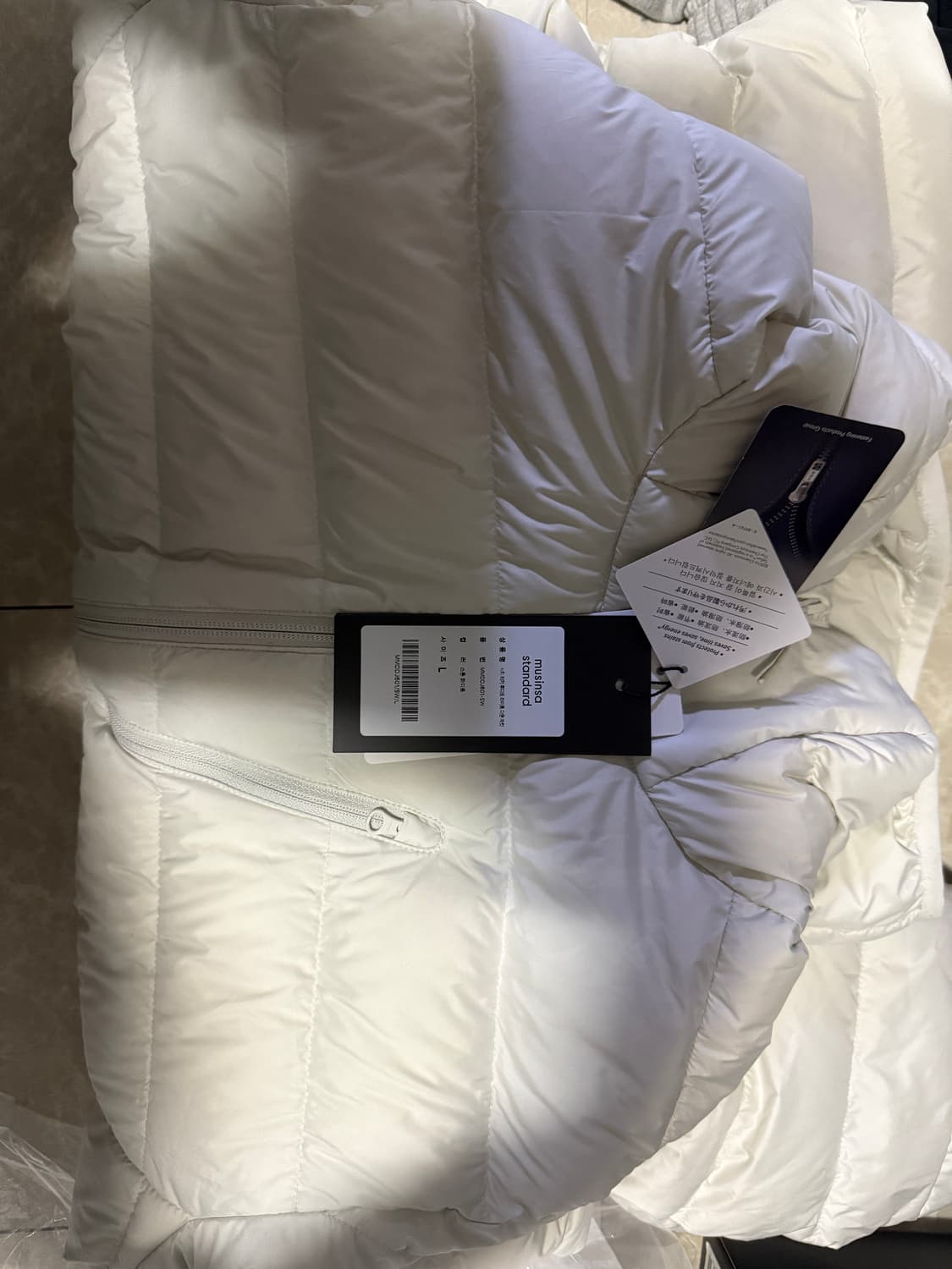 L사이즈 무신사스탠다드 시티 레저 후디드 라이트 다운 스톤화이트 상품이미지1