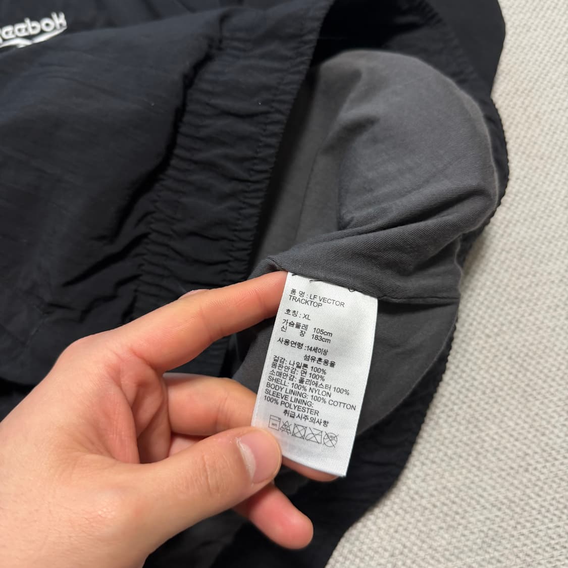 리복 빅로고 패턴 바람막이 자켓 상품이미지3