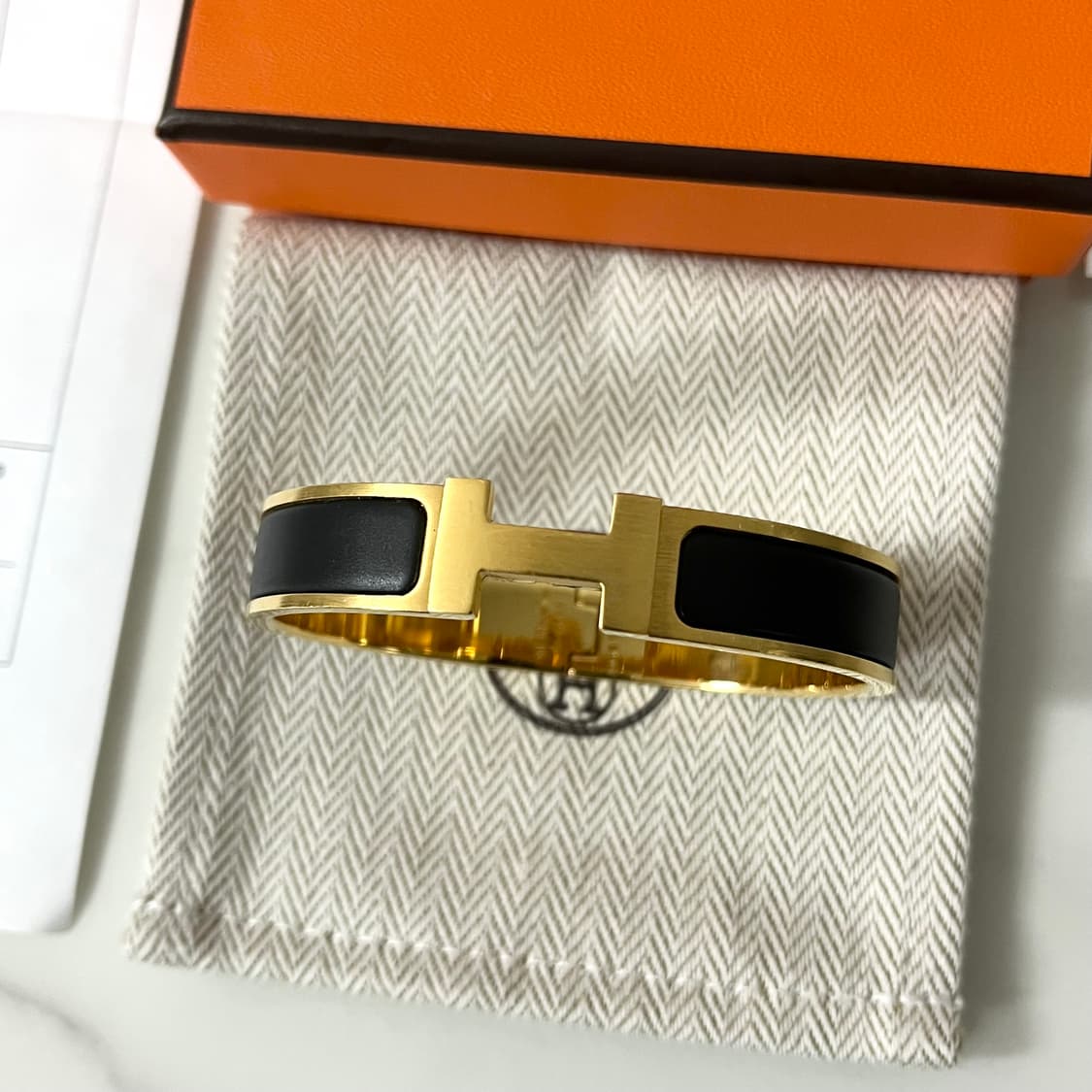 [S급/정품] 에르메스 클릭아슈 HH 팔찌 T4 블랙 골드 상품이미지1