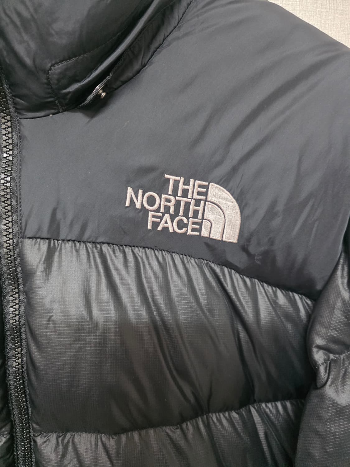 노스페이스 700 눕시 블랙 구스다운 패딩 사이즈 100 하자 마지막사진 상품이미지2