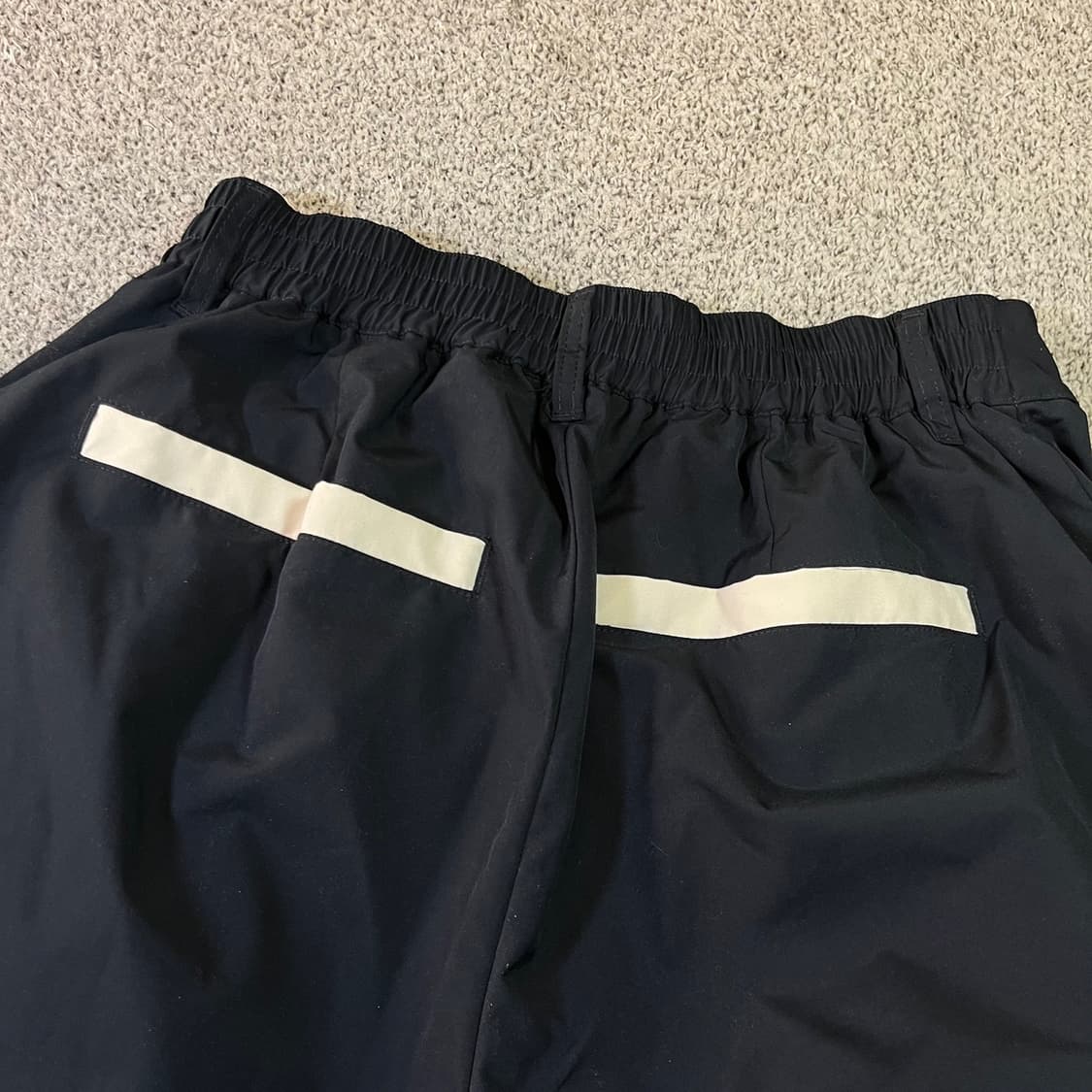 엑스톤즈 배색 커브드 트랙 팬츠 상품이미지2