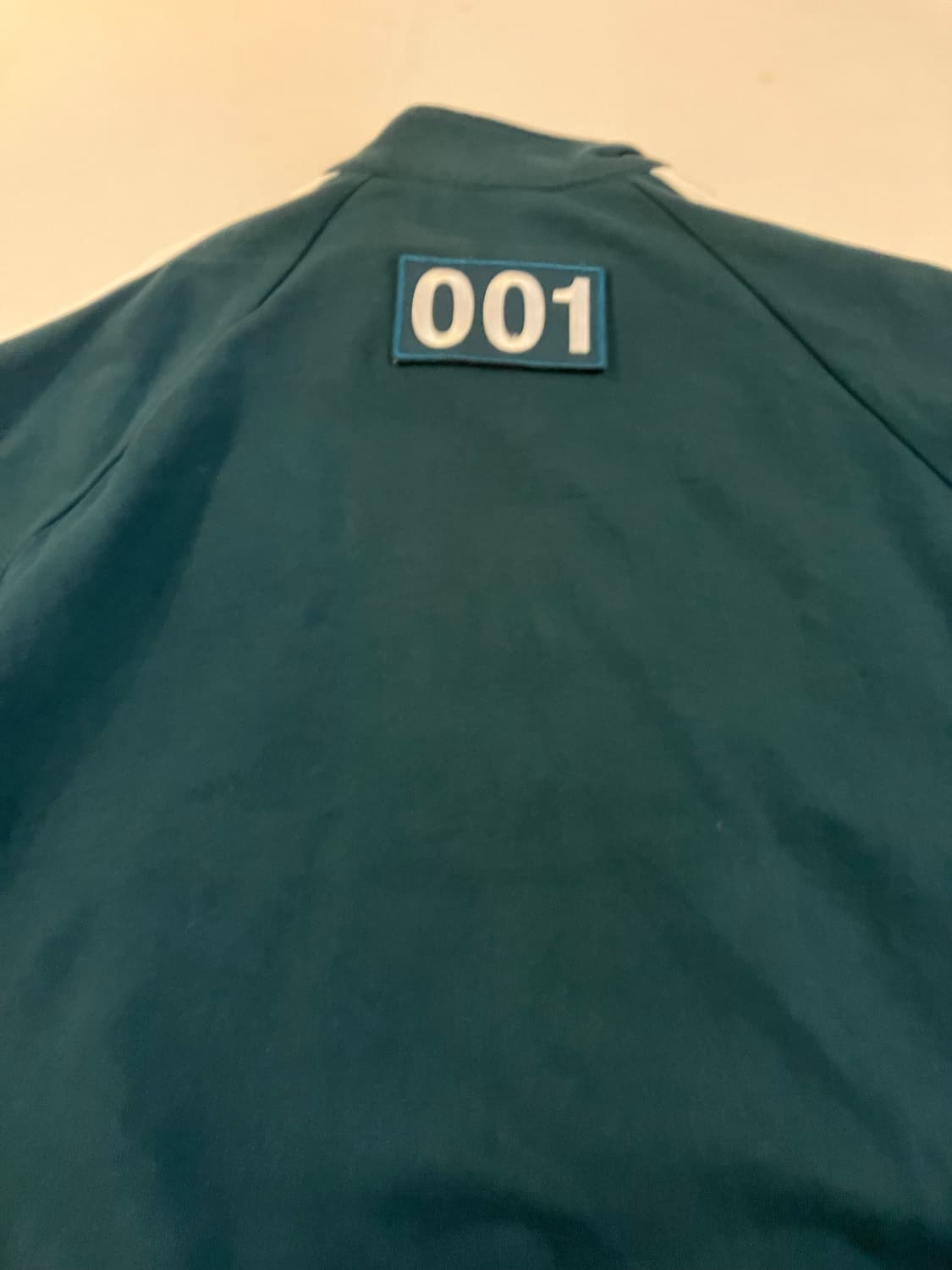 무신사 X 넷플릭스 오징어게임 오일남 001 져지 상품이미지3