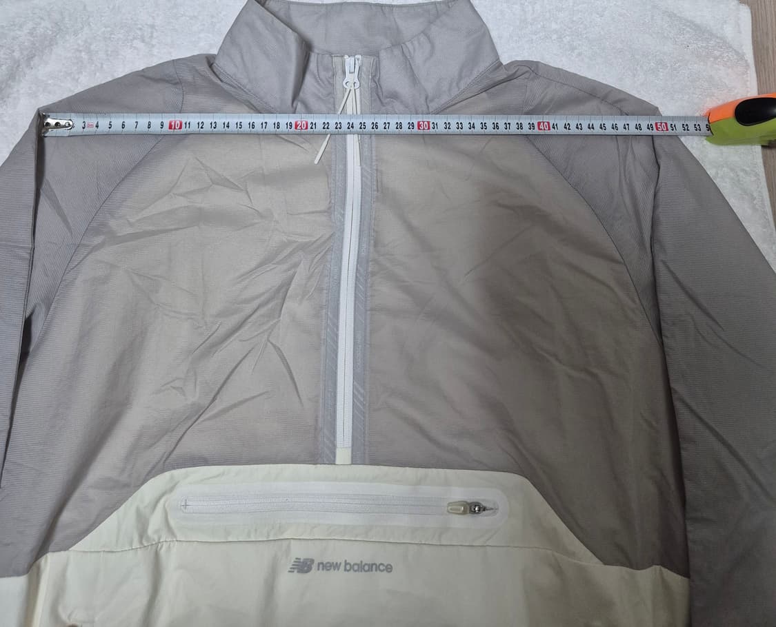 🦕. 뉴발란스 바람막이아노락 105 / L 상품이미지4
