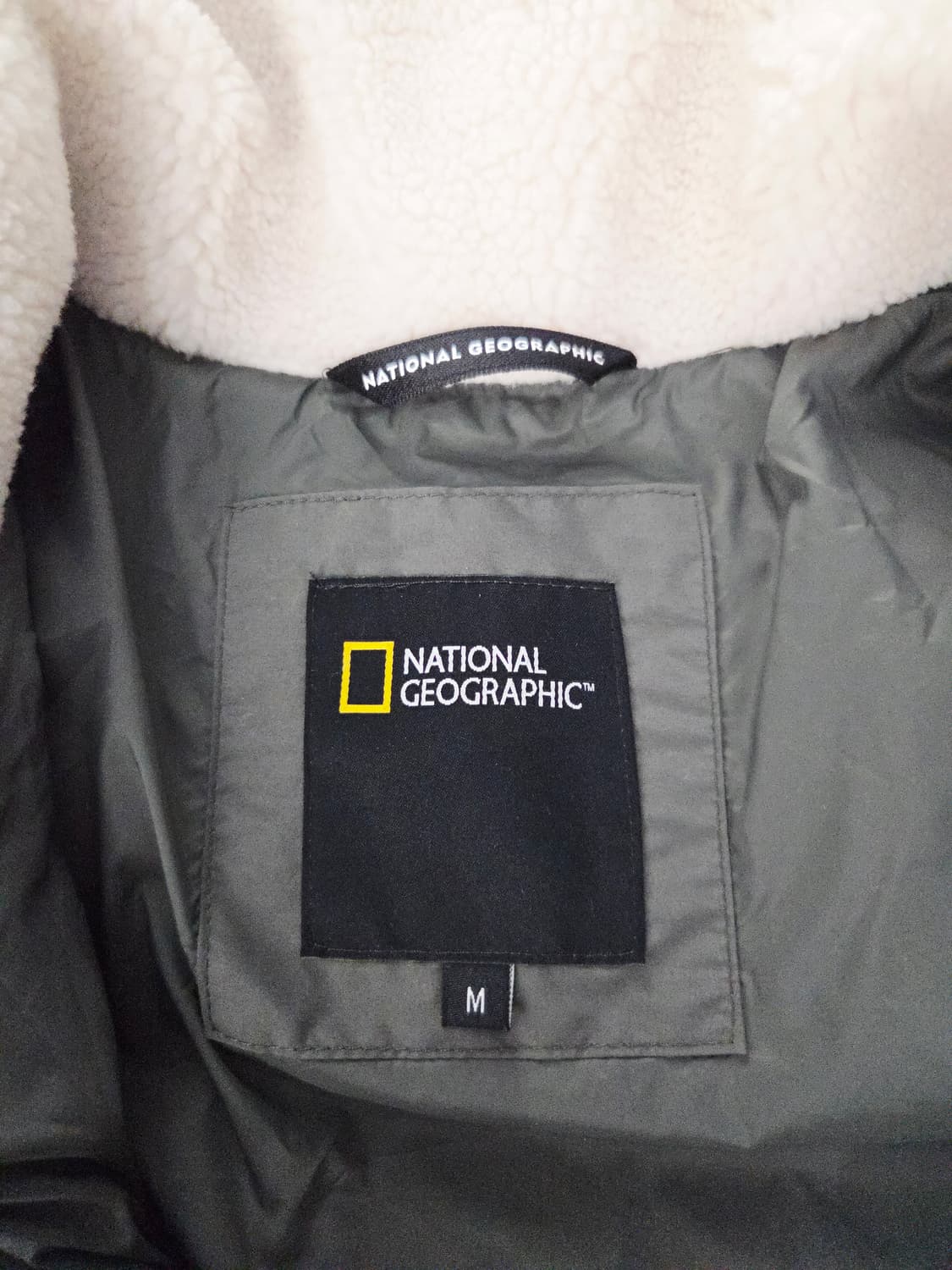 내셔널지오그래픽 뽀글이 덕다운 숏패딩 카키 상품이미지7