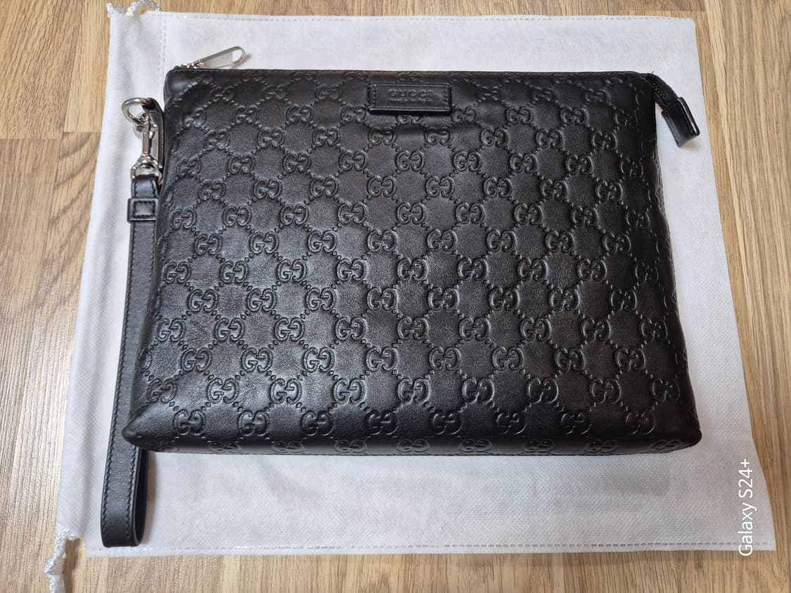 구찌 씨마 소프트 클러치백 입니다 상품이미지1