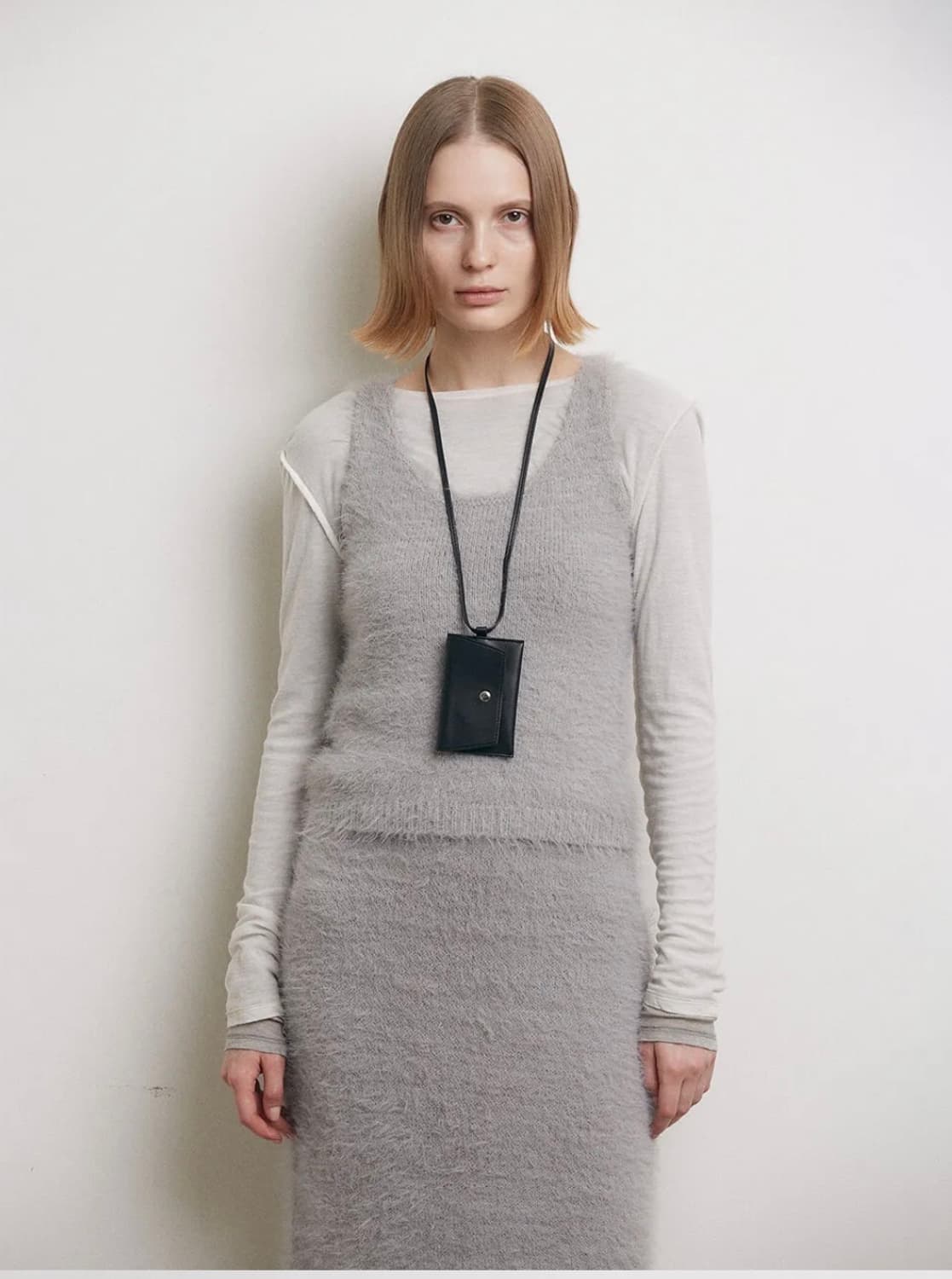 로우타이드 슬리브리스 니트탑 그레이 상품이미지1