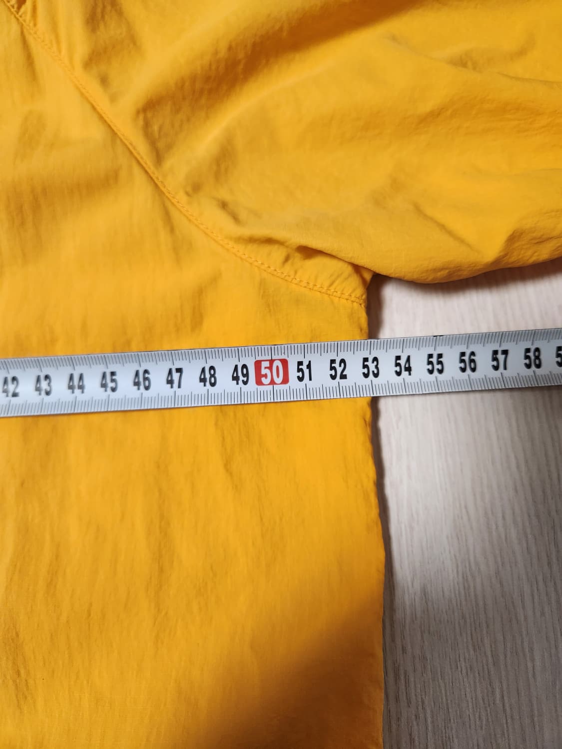 노스페이스 머스타드 옐로우 히든 후드 경량 바람막이 사이즈95m

여러  상품이미지2