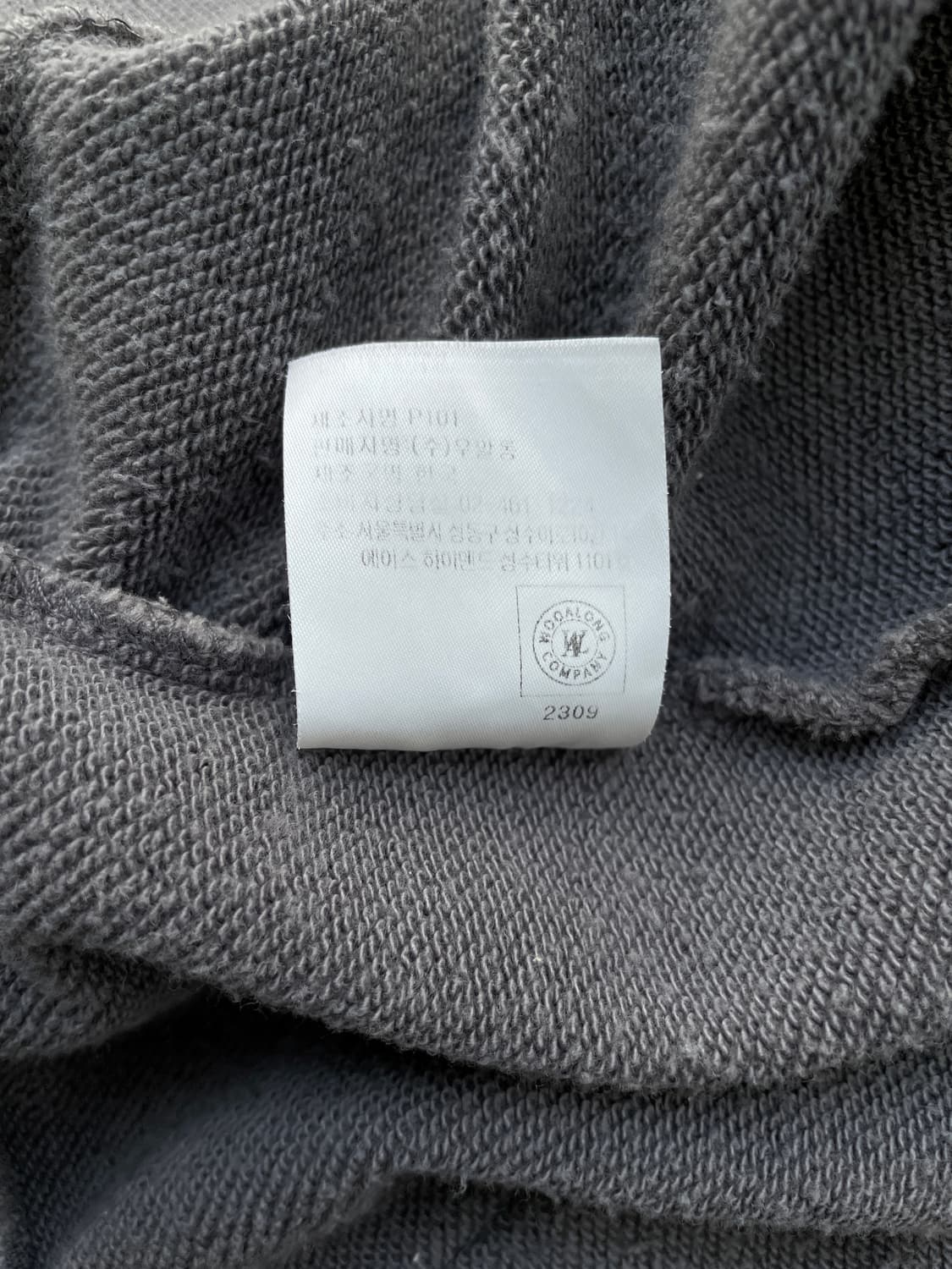 우알롱(WOOALONG) 시그니처 로고 투웨이 후드 집업 상품이미지4