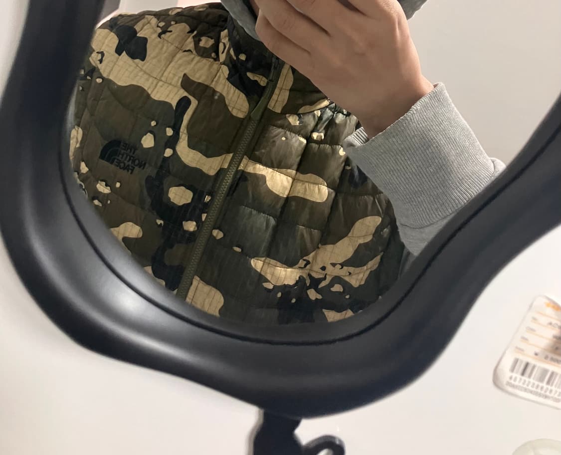 노스페이스 카모 경량조끼 상품이미지1