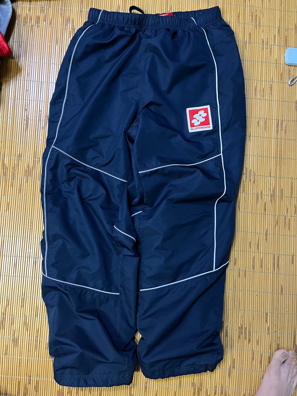 Supreme reflective piping track pants 상품이미지1