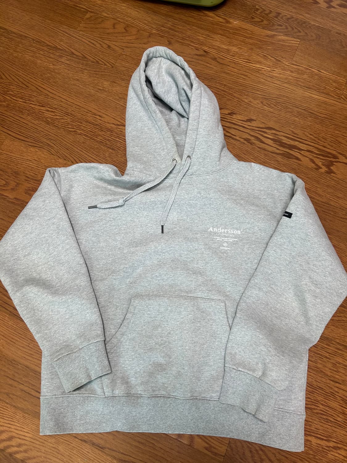 앤더슨벨 그레이 후드티 상품이미지1