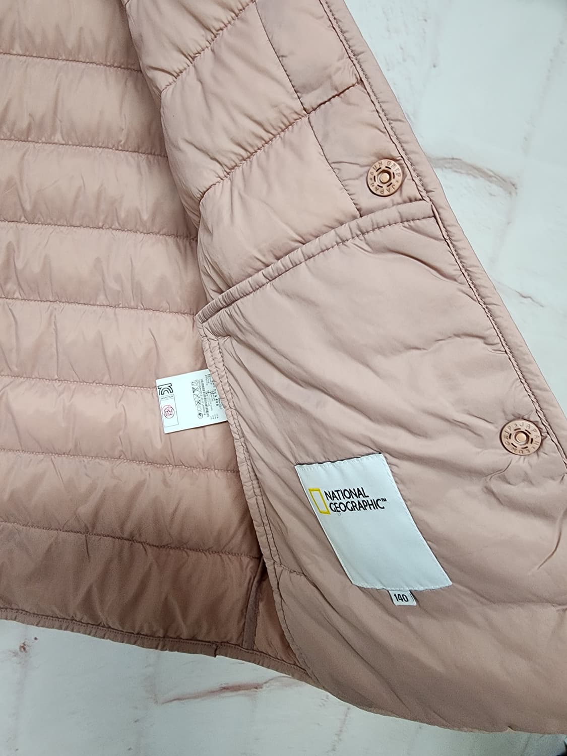 내셔널지오그래픽 핑크색 패딩 조끼 상품이미지5