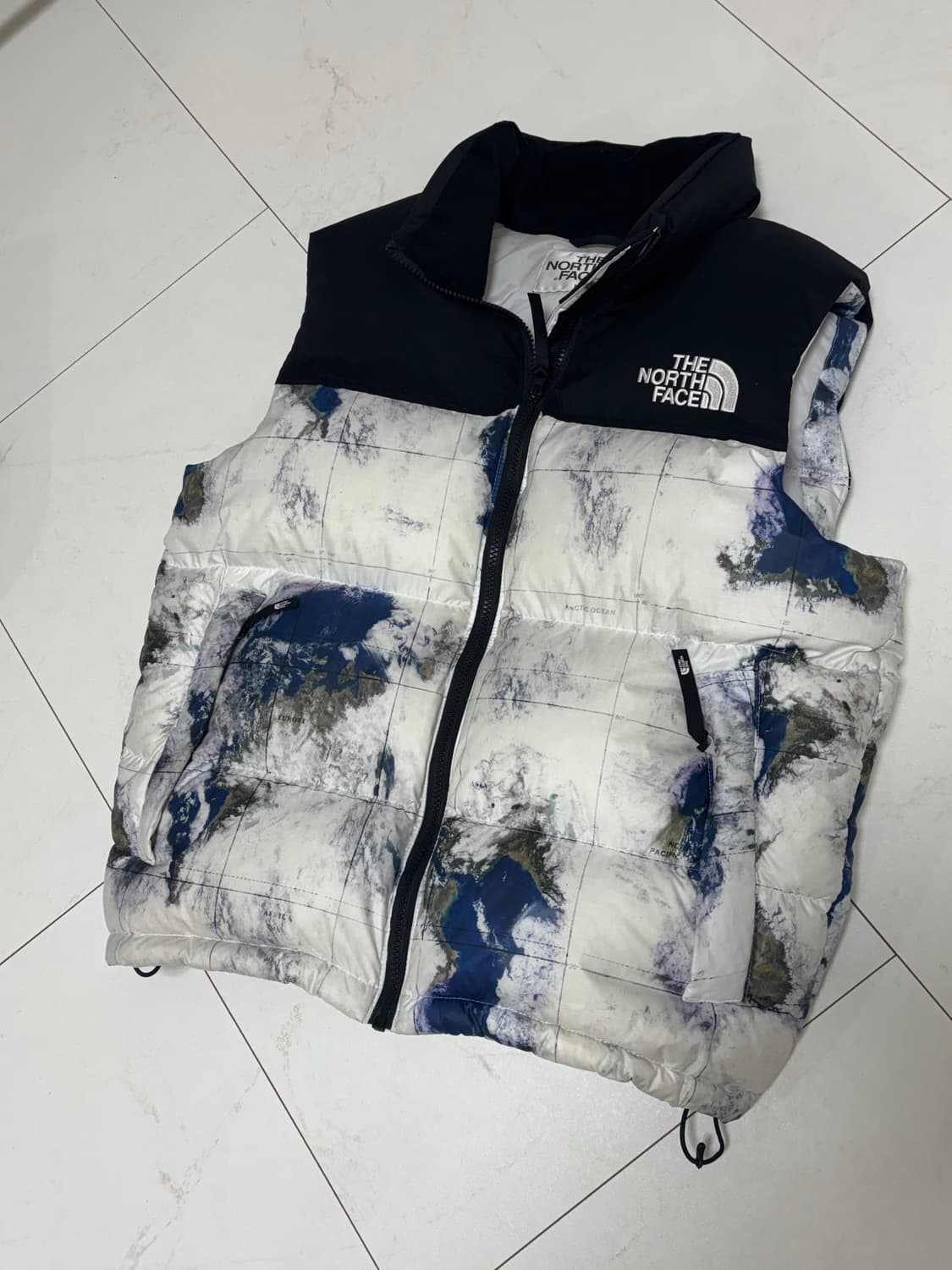 노스페이스 눕시 화이트라벨 노벨티 지구 조끼패딩 상품이미지1