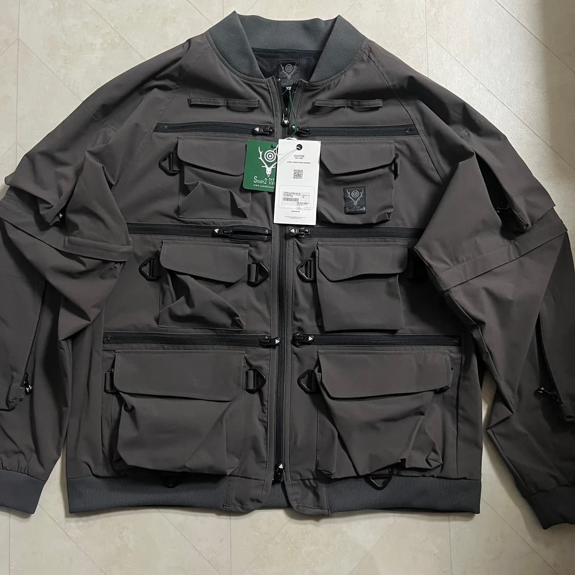 새상품(M)남이서팔 멀티 포켓 지퍼 투웨이 자켓 립스탑 차콜 상품이미지1