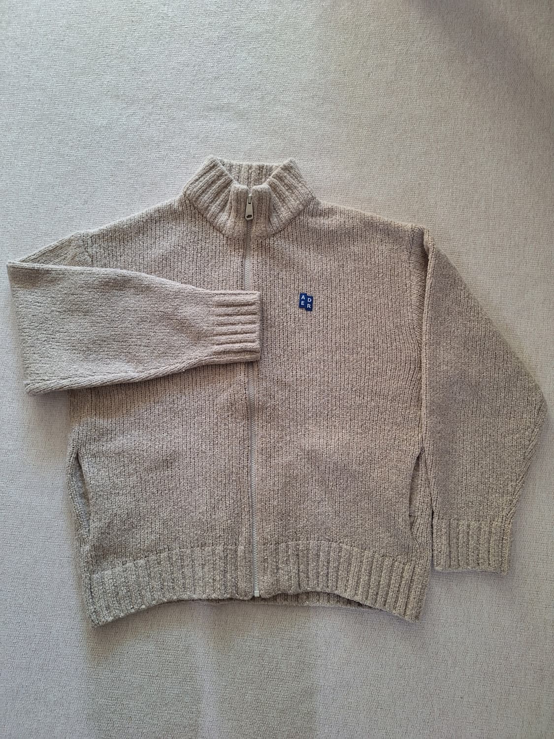 아더에러 시그니피컨트 TRS 태그 니트집업 01 오트밀 L사이즈 상품이미지1