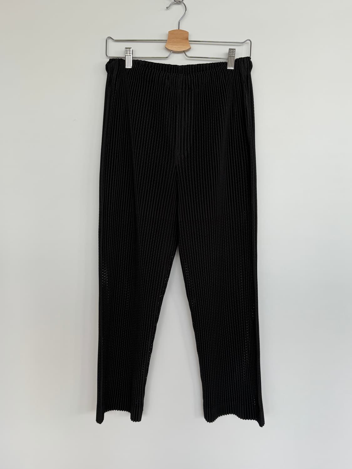 옴므플리세 블랙 메쉬팬츠 1 상품이미지1