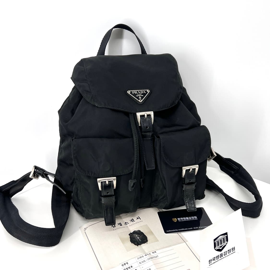 [감정완료] 프라다 삼각로고 나일론 백팩 블랙 스몰 상품이미지1