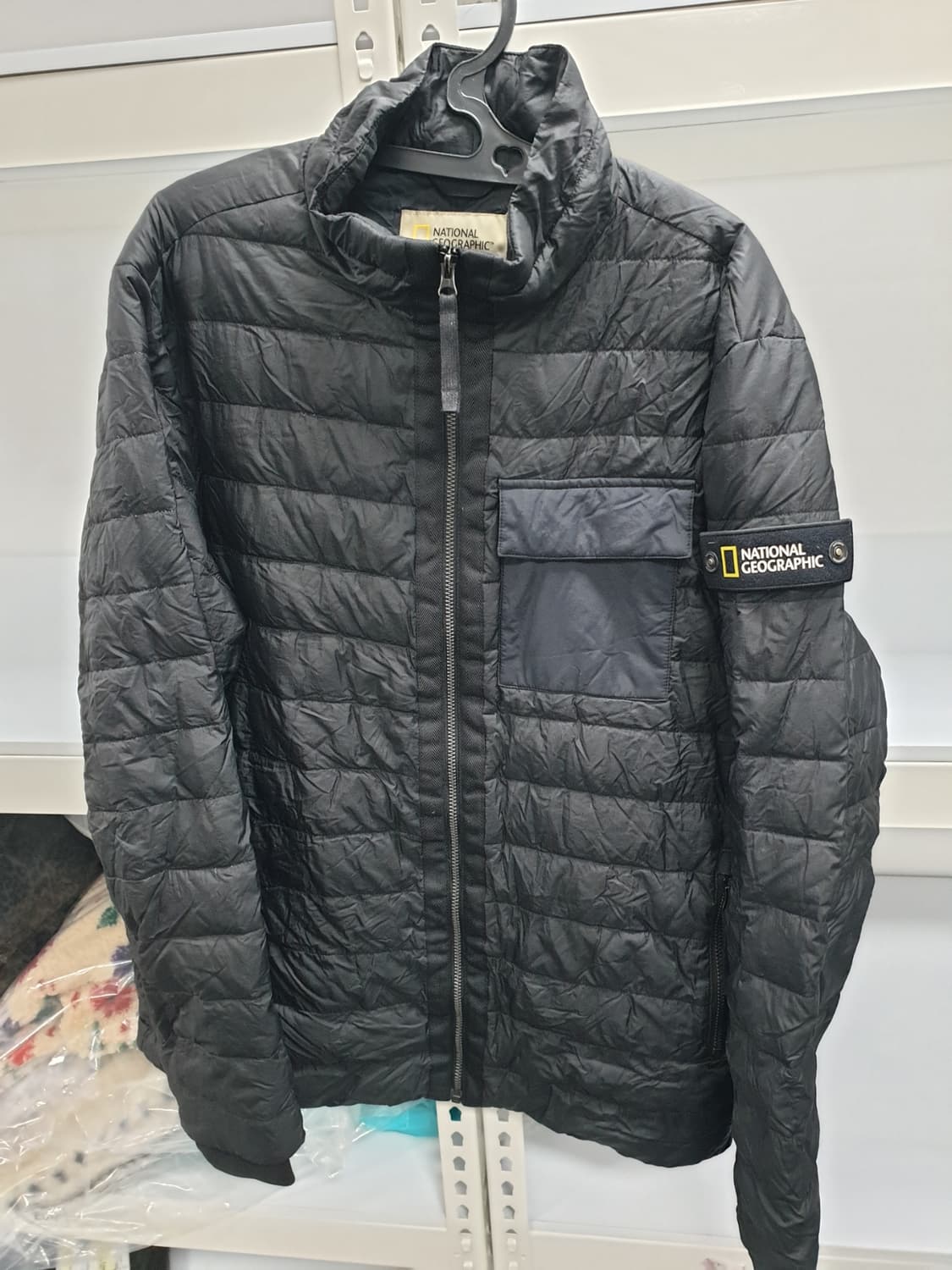 네셔널지오그래픽 정품 구스경량패딩 110사이즈 팝니다 상품이미지1