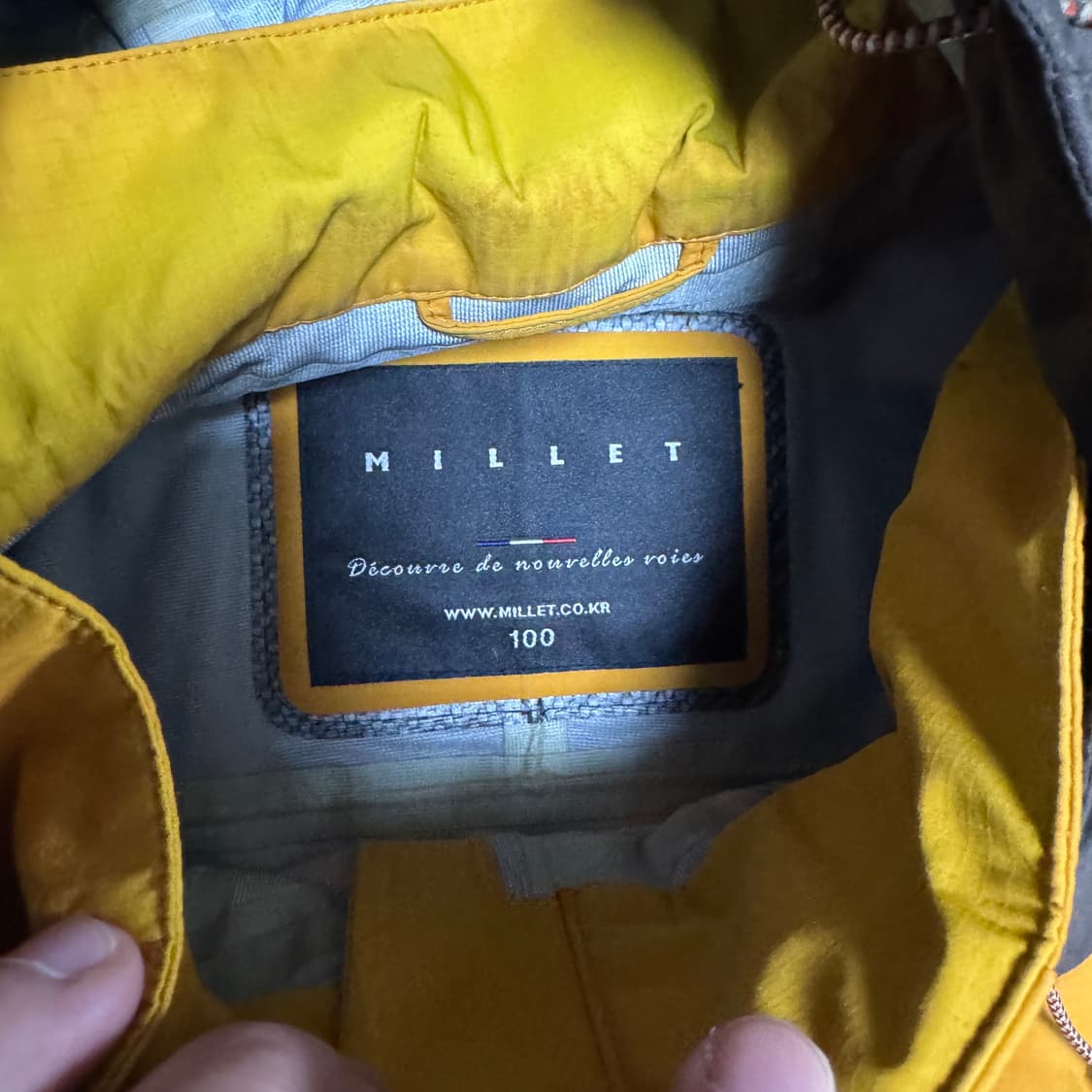 밀레 바람막이 오렌지 블랙 배색 상품이미지4