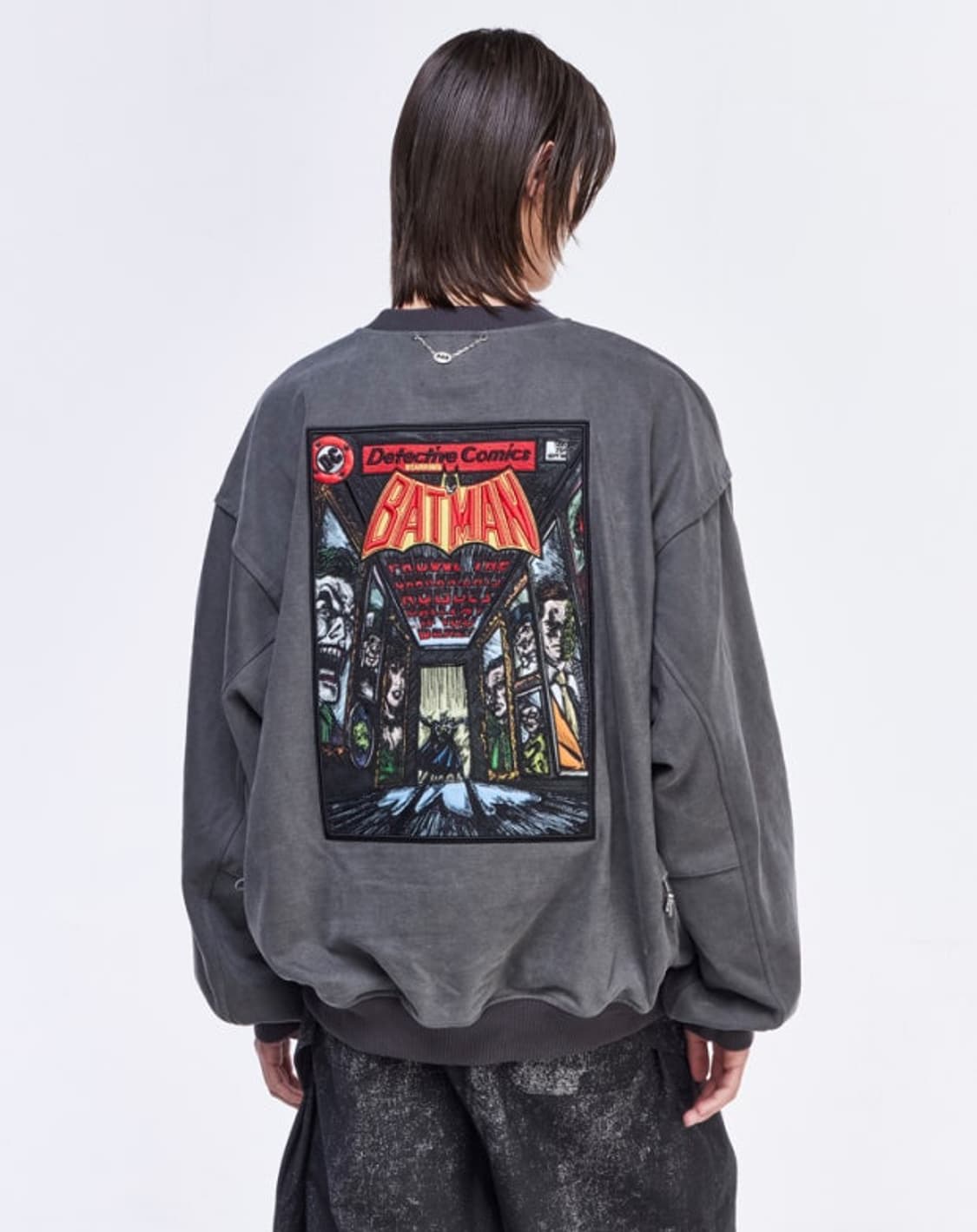 송지오 옴므 25FW DC 콜라보 배트맨 윙스트링 다잉 맨투맨 상품이미지1