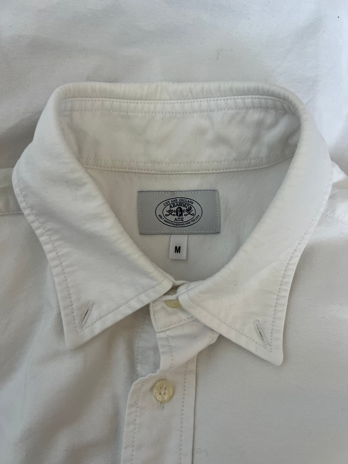 베이프 남여공용 화이트 코튼긴팔셔츠

 상품이미지3