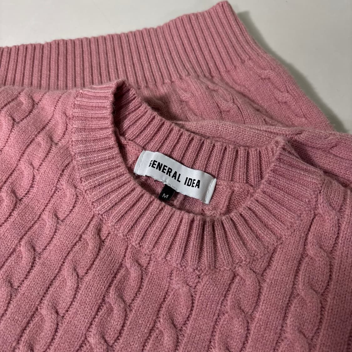 우먼M 제너럴아이디어 분홍 꽈배기니트 상품이미지1