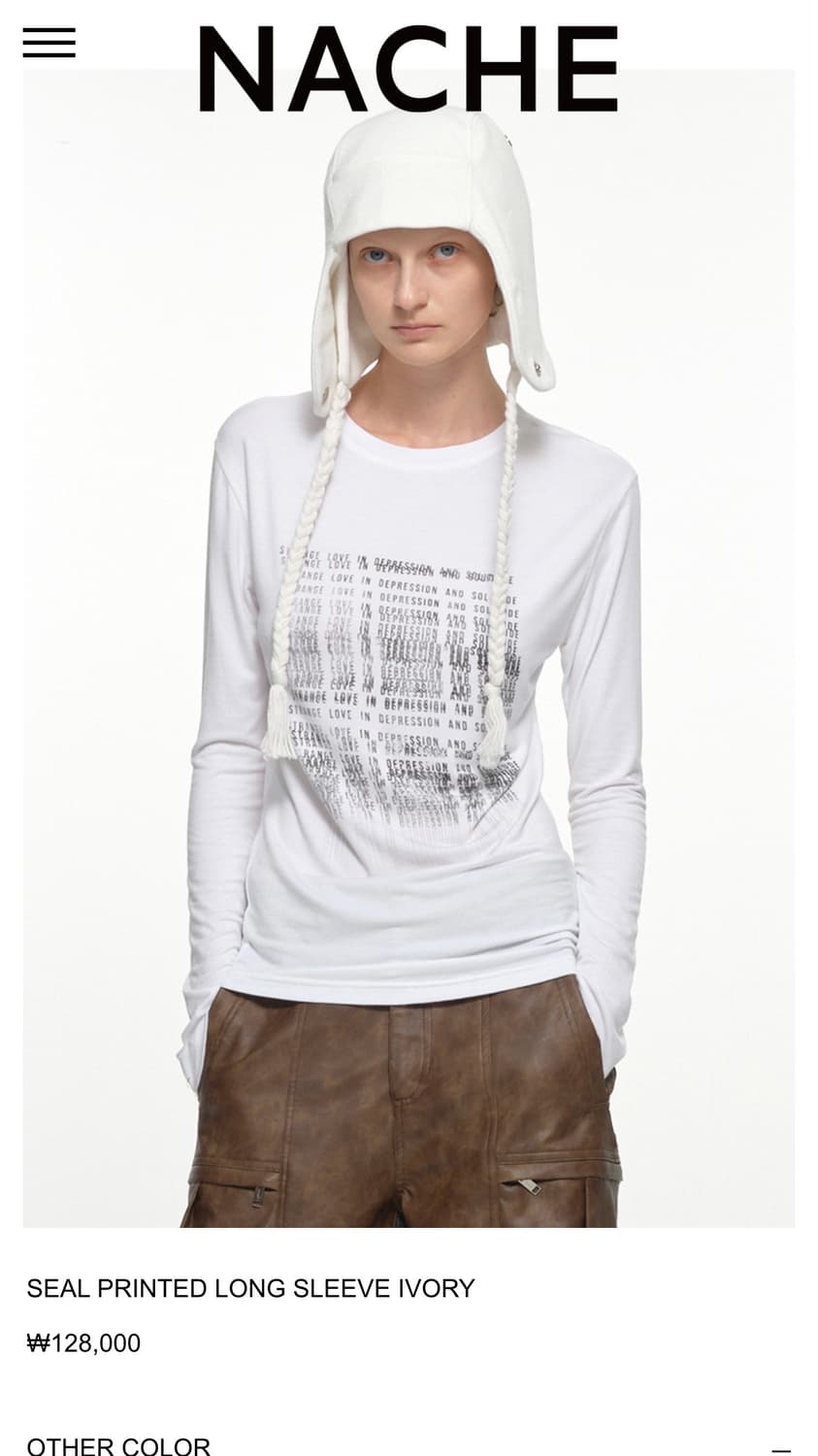 [새상품]SEAL PRINTED LONG SLEEVE IVORY 상품이미지1