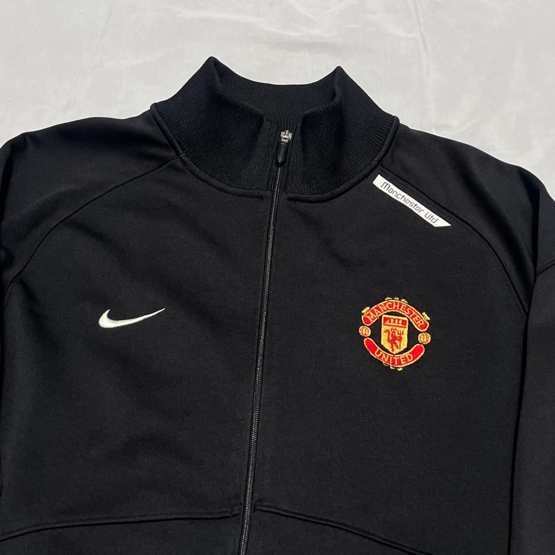 M 나이키 맨체스터 유나이티드 블랙 트랙탑   상품이미지1