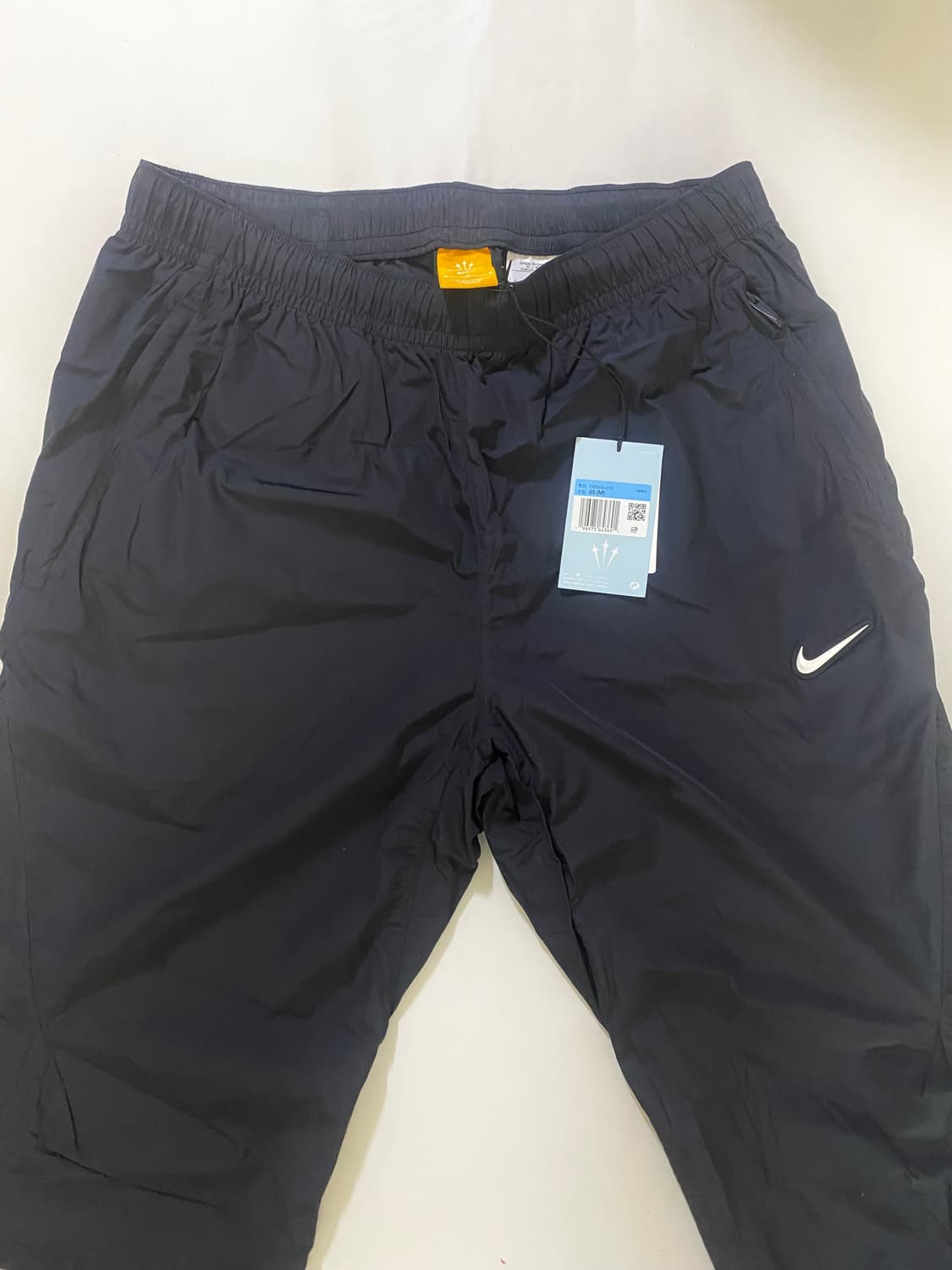 나이키x드레이크 녹타 우븐 트랙 팬츠 블랙(FN7668-010) M사이즈 상품이미지1