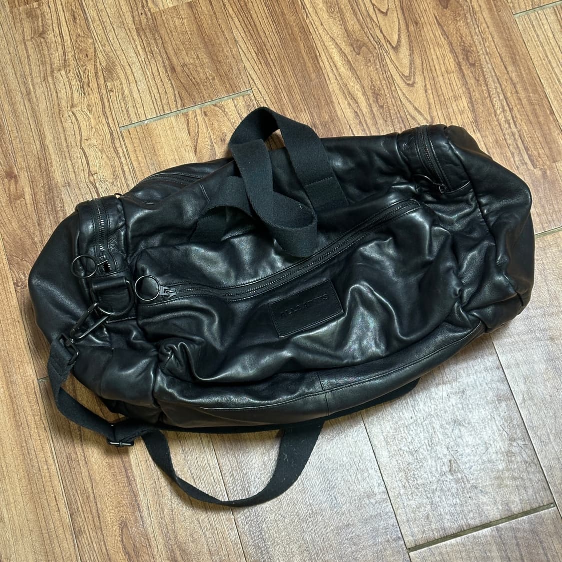 올세인츠 레더 더플백 상품이미지1