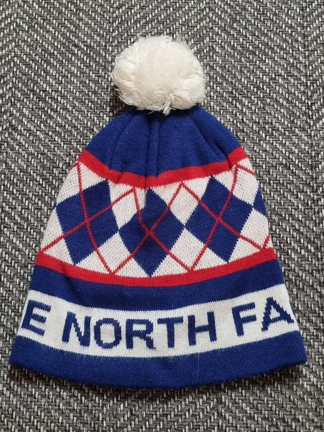 The North Face — 블루 아가일 패턴 폼폼 비니 상품이미지1