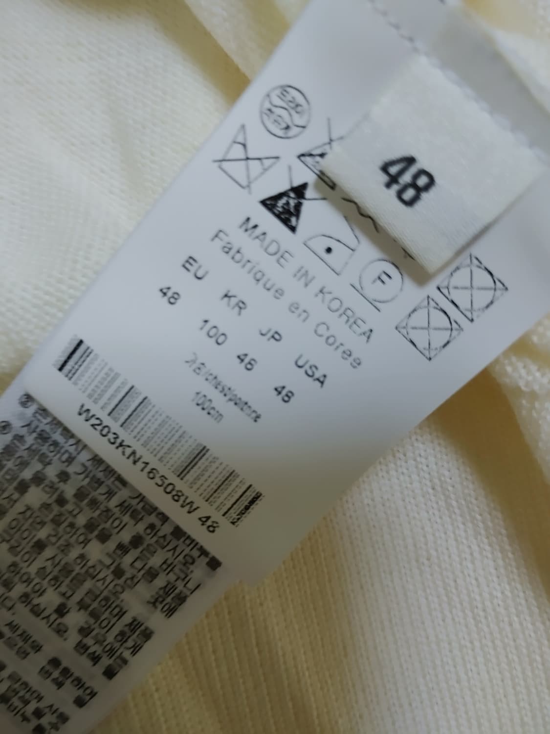 우영미 백로고 절개 니트 팝니다 상품이미지6