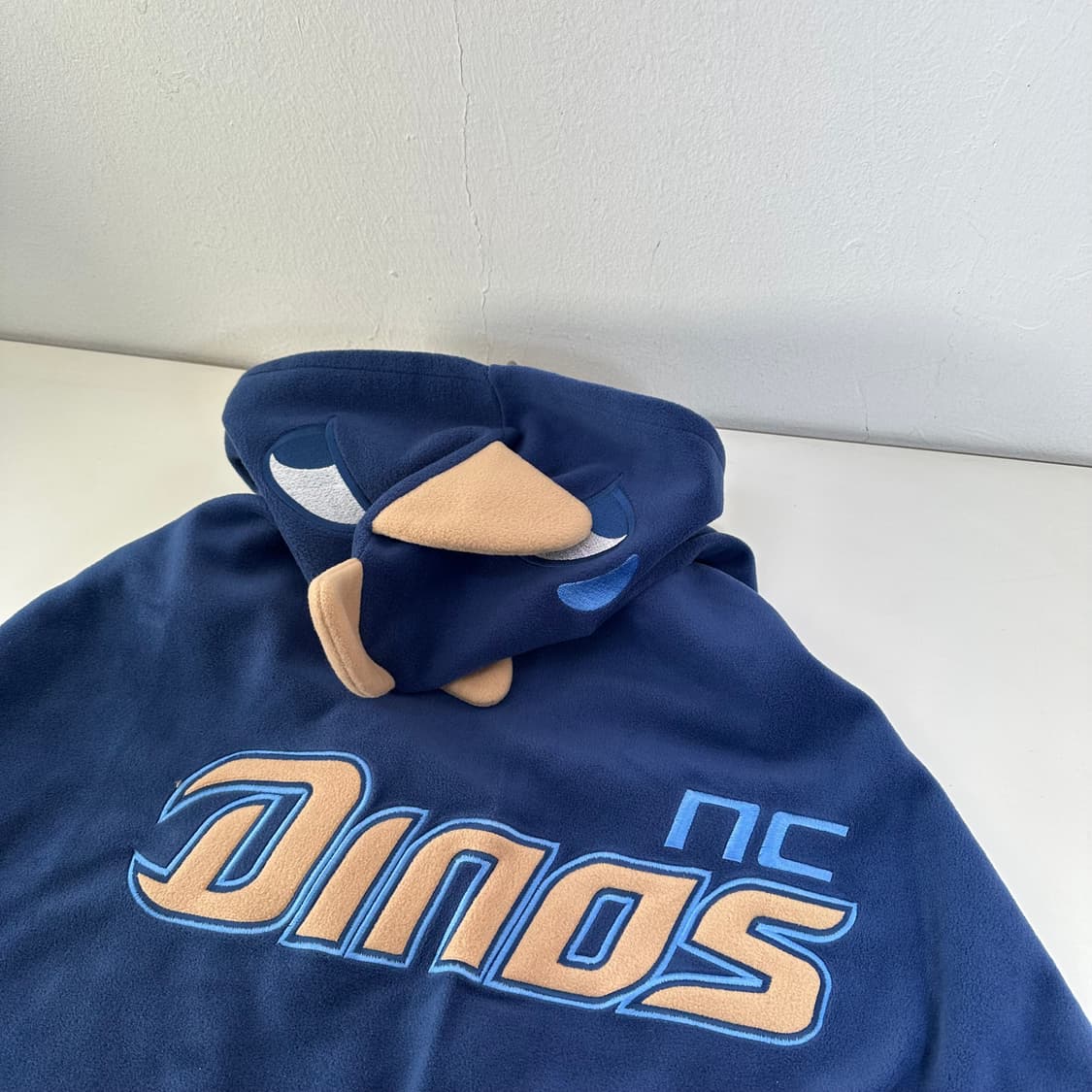 OS NC다이노스 단디 플리스 후드 케이프 담요 상품이미지1