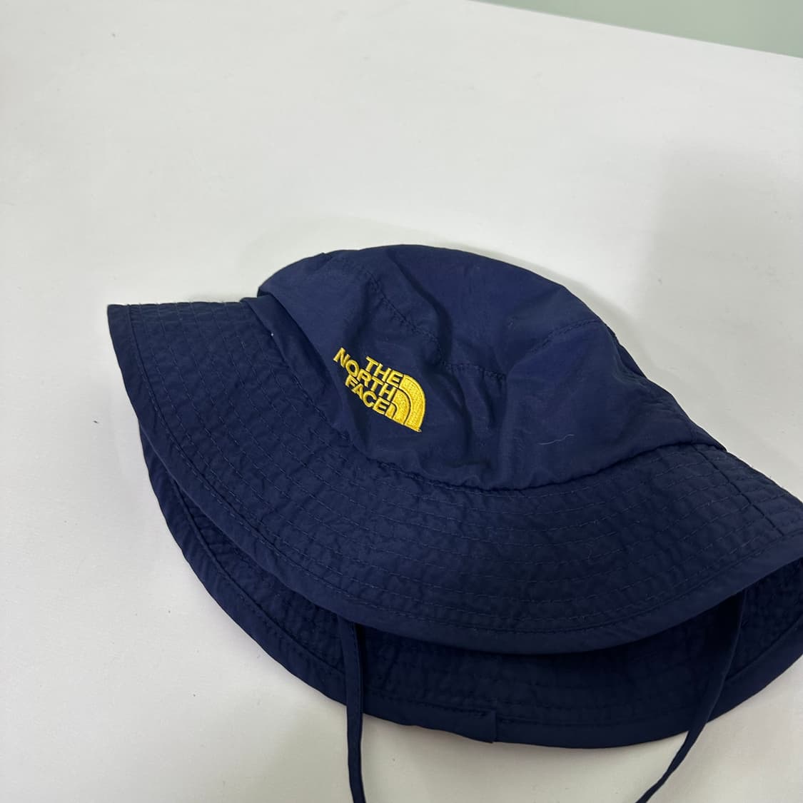 OS 노스페이스 키즈 네이비 나일론 버킷햇 상품이미지1