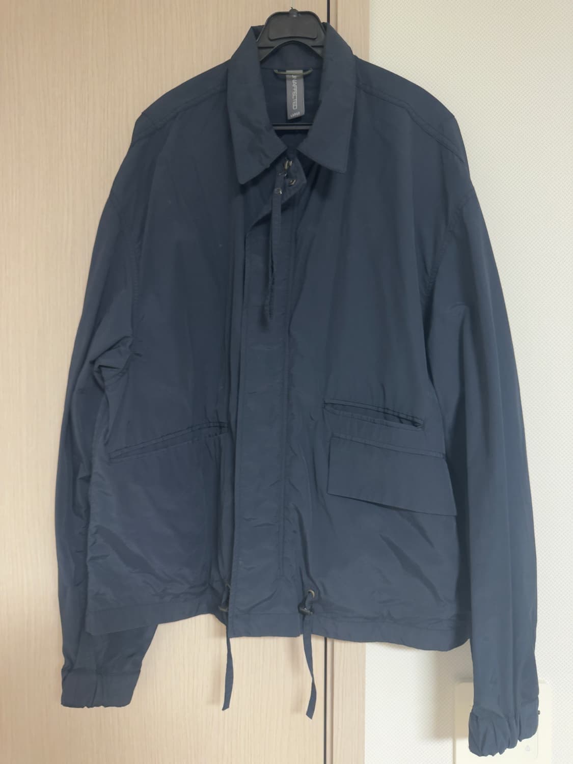 언어펙티드 바람막이 네이비 L 상품이미지1