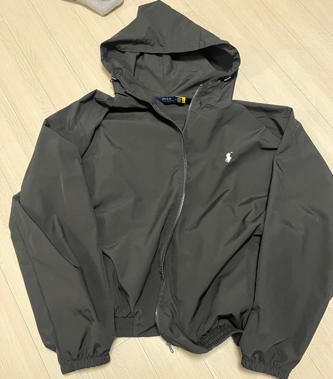 폴로 블랙 바람막이 L 상품이미지1