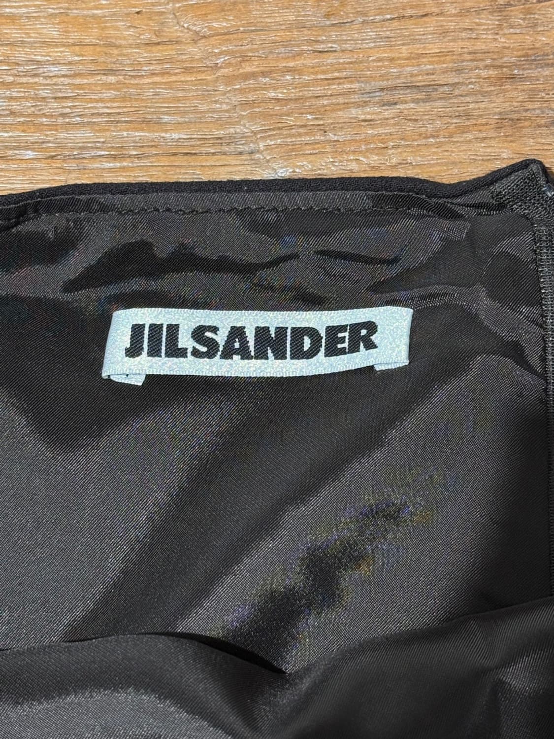 질샌더 딥 브라운 버진 울 백 슬릭 미디 스커트 상품이미지7