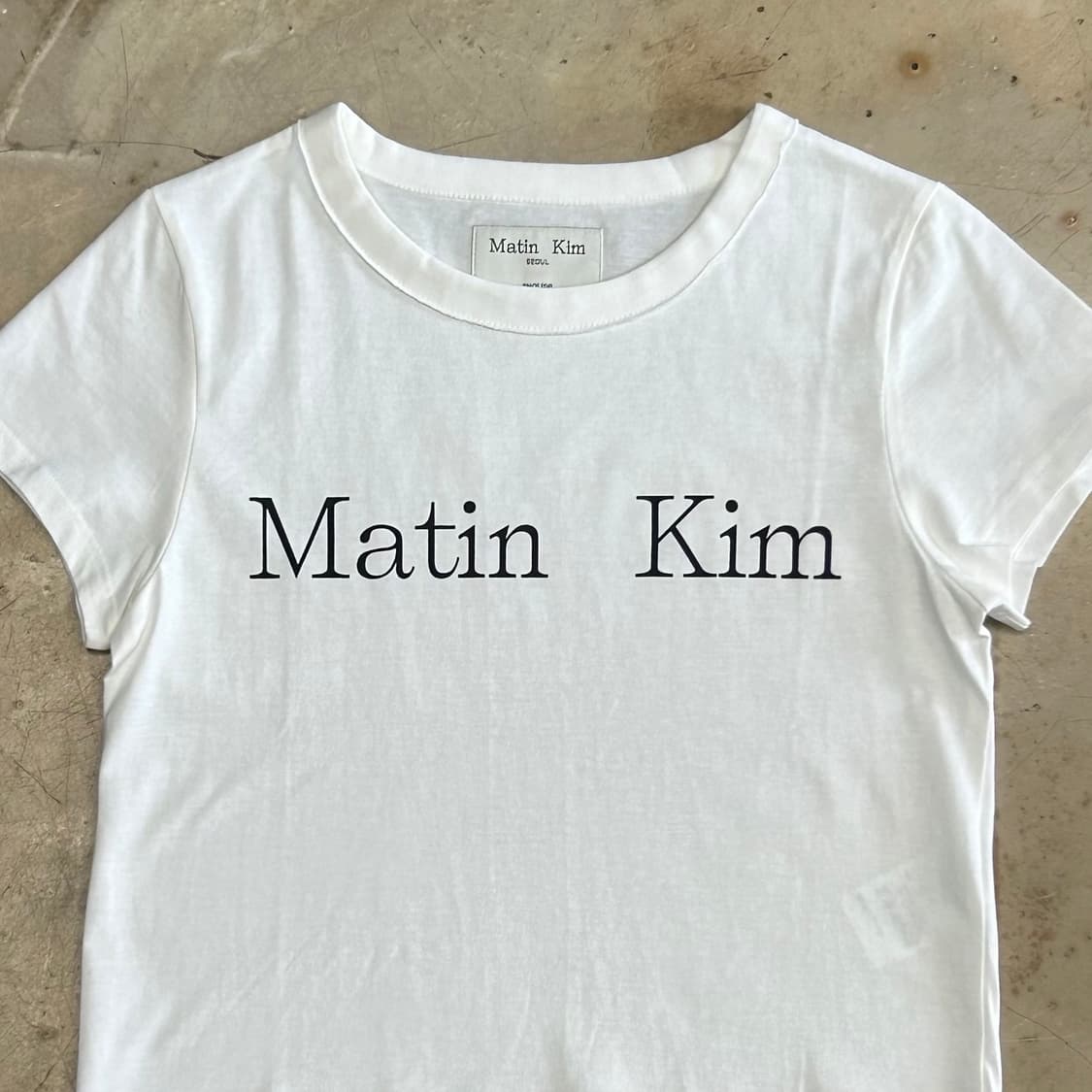 S 새상품 마뗑킴 여성용 화이트 크롭 반팔티 상품이미지1