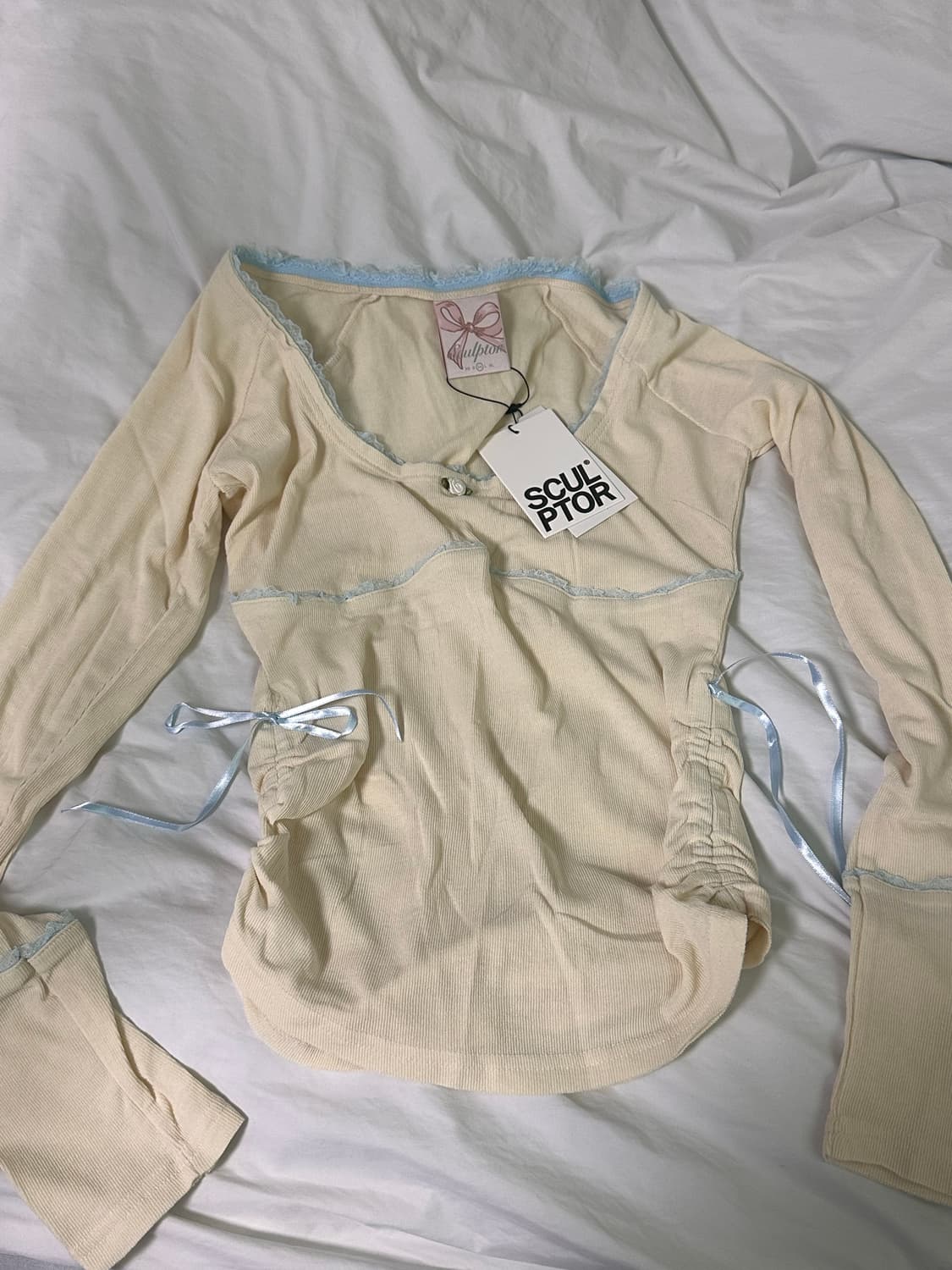 스컬프터 리본 긴팔 티 아이보리 상품이미지3