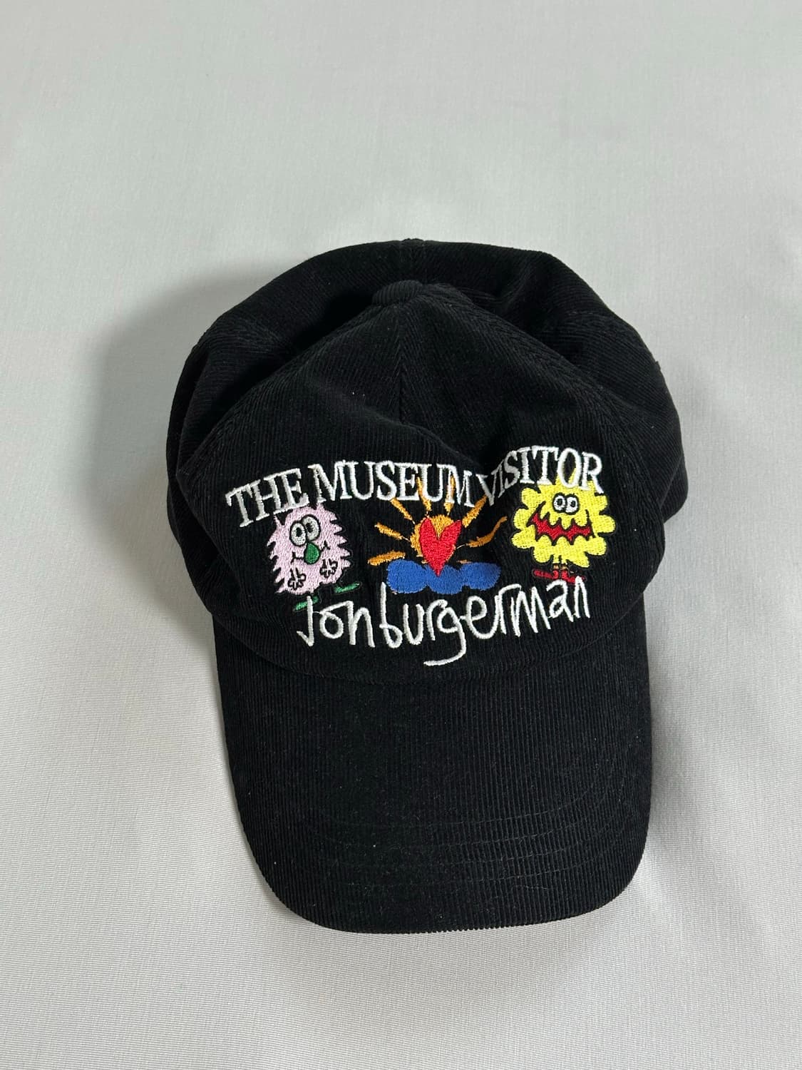 더뮤지엄비지터 존버거맨 볼캡 블랙 상품이미지1