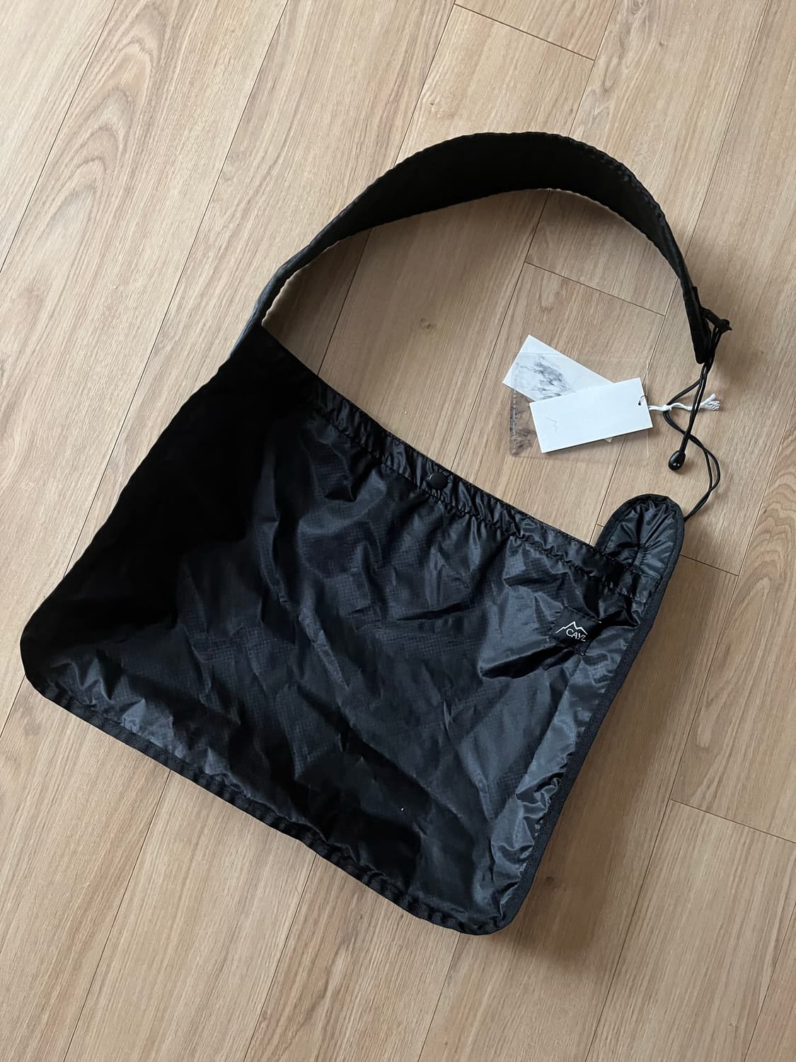 cayl 케일 라이트 패커블 크로스백 블랙 상품이미지1