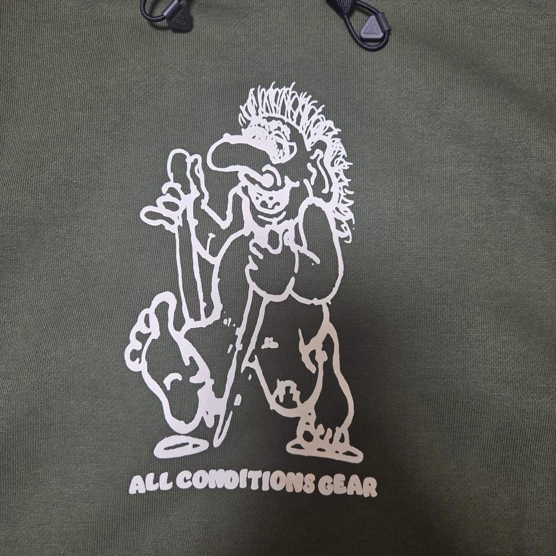 [asia L] 나이키 ACG 써마핏 플리스 후드 트롤 그래픽 카고 카키 상품이미지3