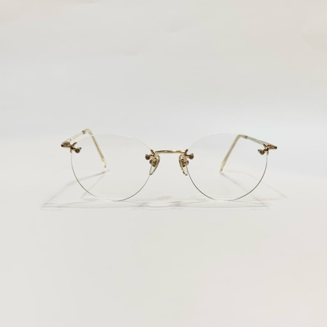 [픽키-680] 골드 라운드 림리스 안경 미니멀 클래식 상품이미지1