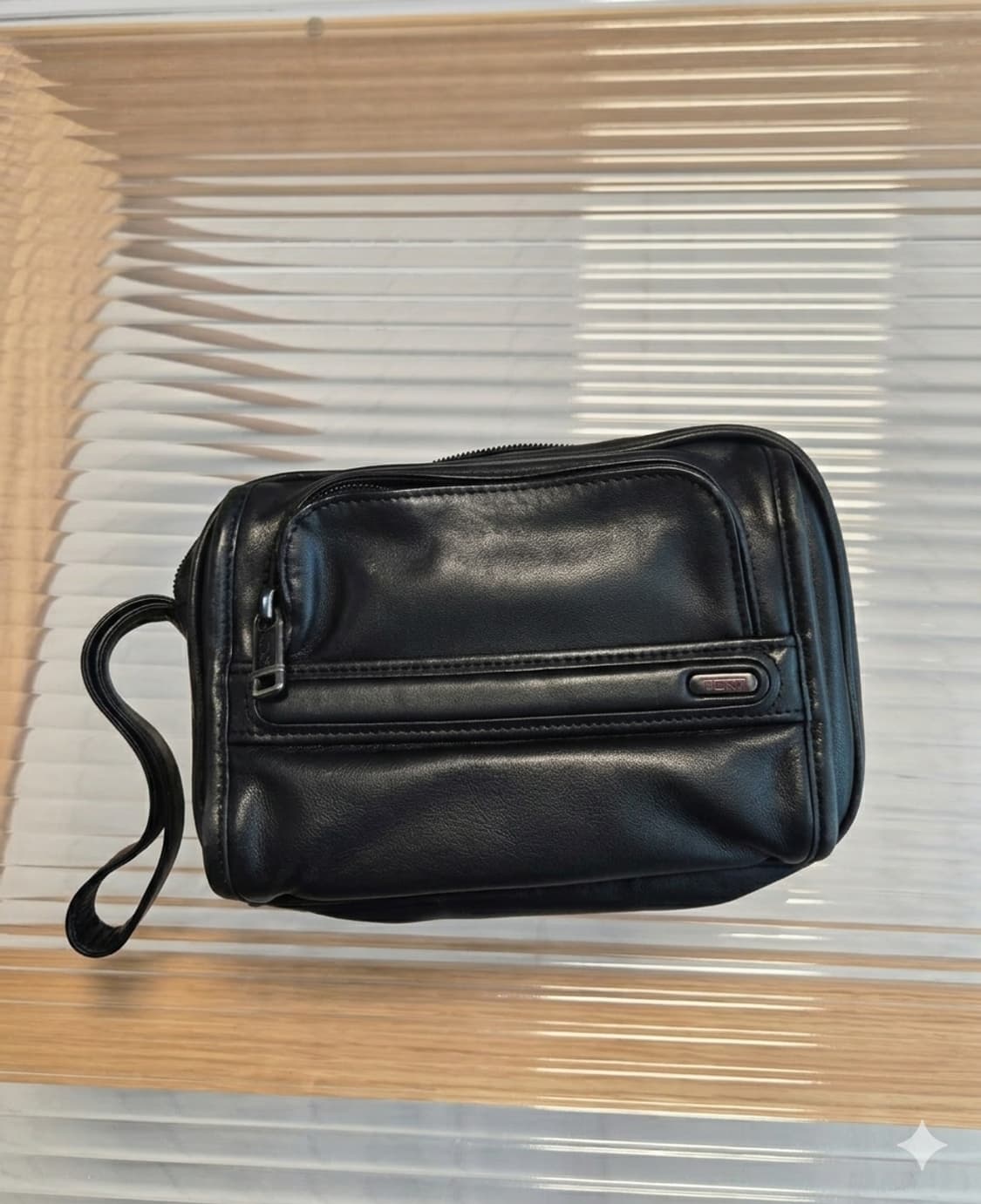 TUMI(투미)의 레더 클러치(세컨드백) 상품이미지1