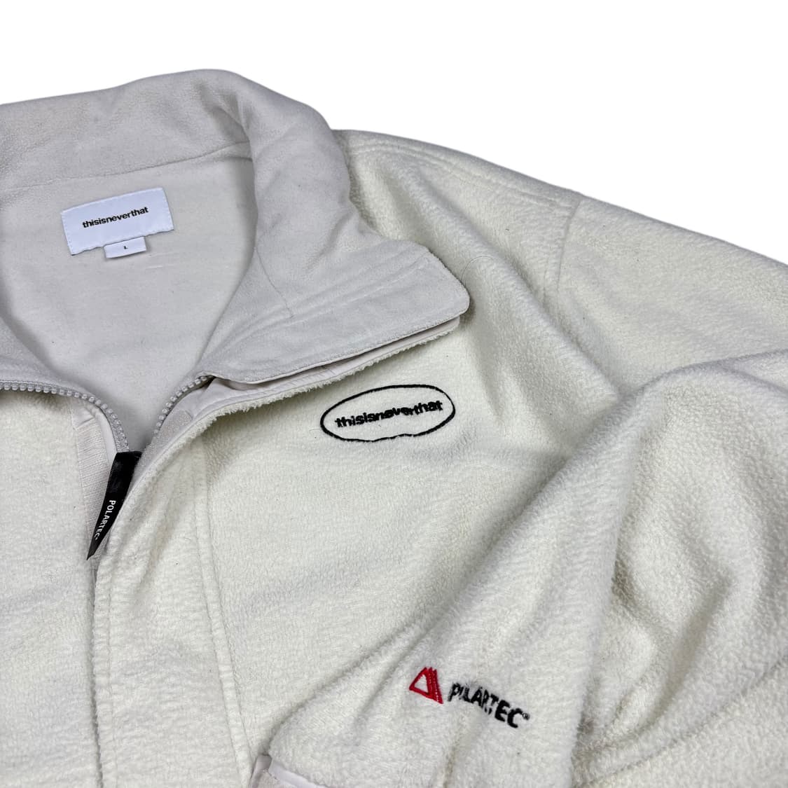 디스이즈네버댓 아이보리컬러 폴라텍 플리스 상품이미지4