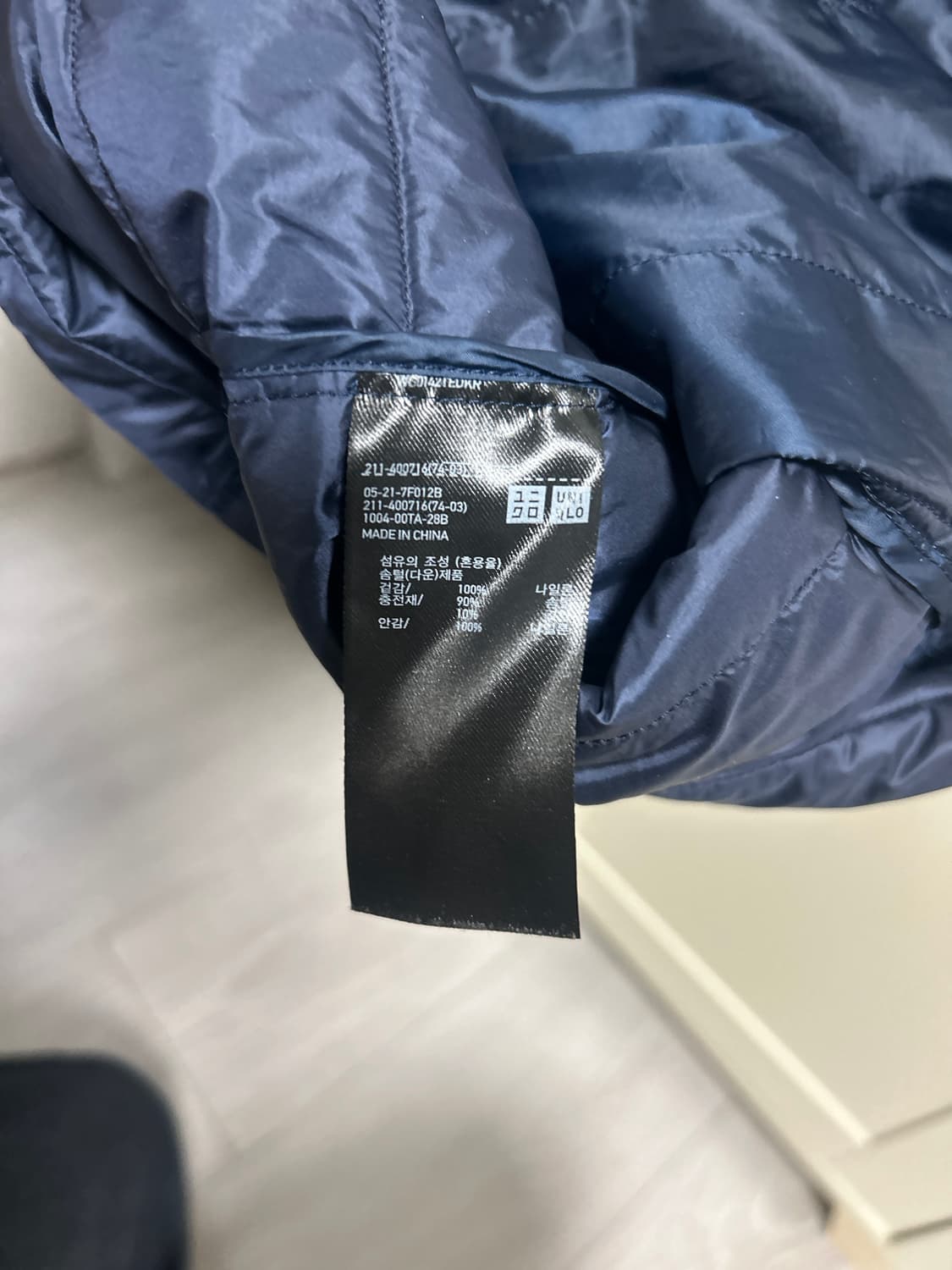 유니클로 경량패딩조끼 여성 L  상품이미지4