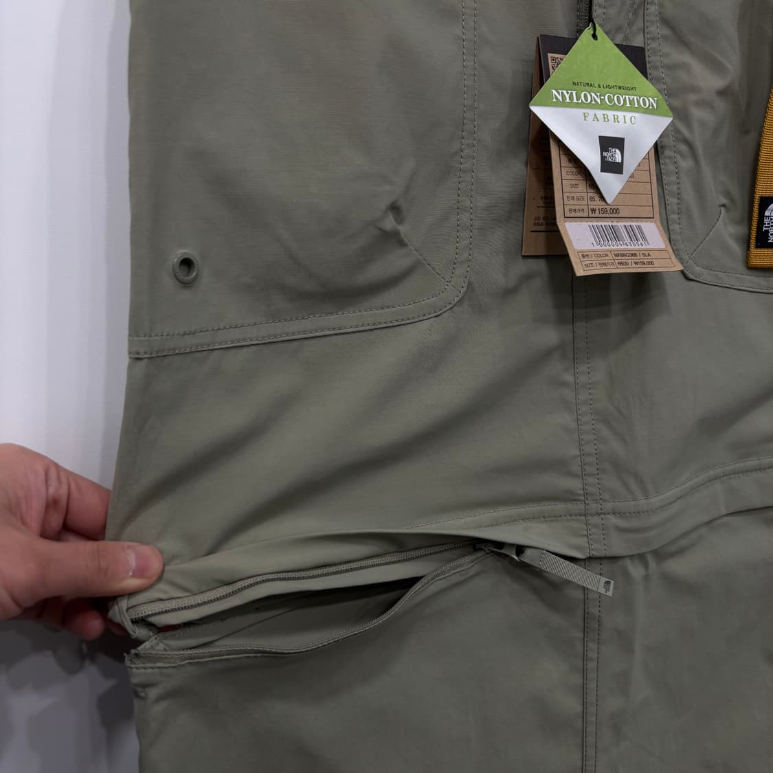 (W)The North Face  기어 업 디테 쳐블 듀얼 스커트 카키 상품이미지5