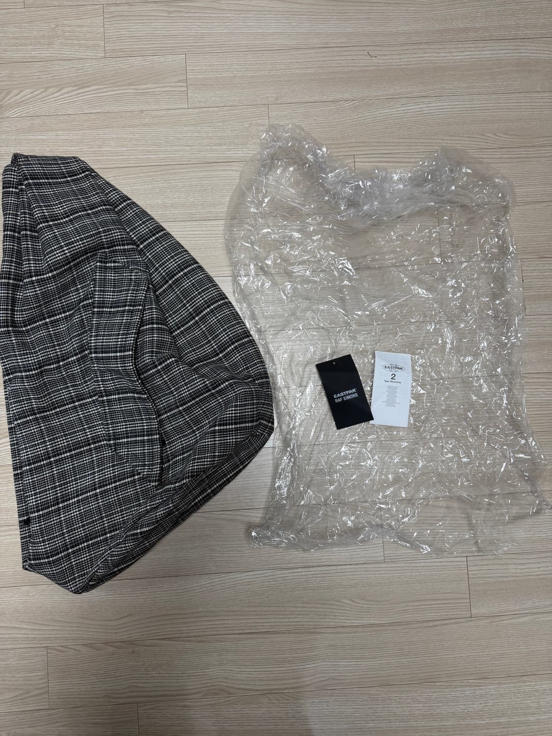 라프시몬스 이스트팩 슬링백 체크 상품이미지1