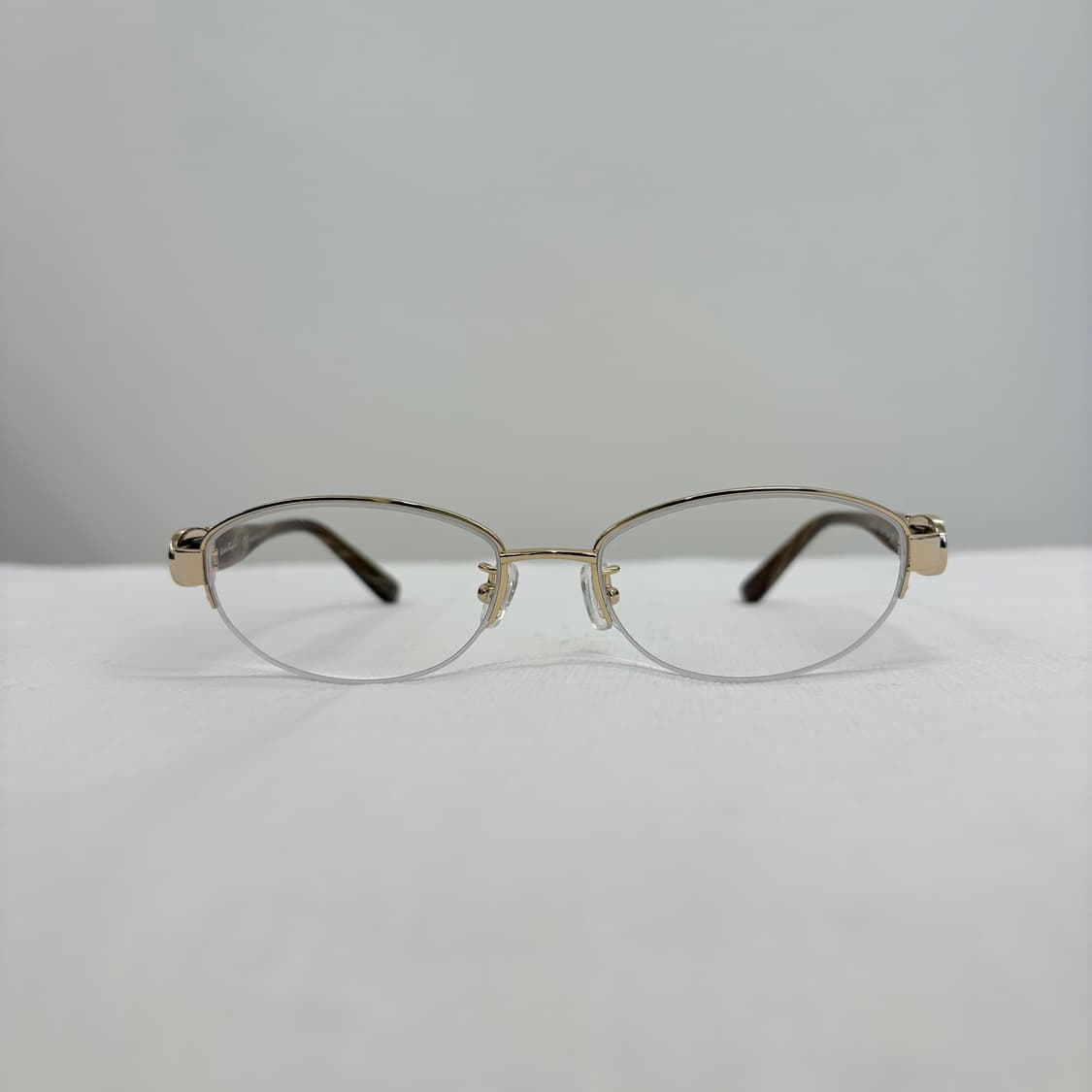 FERRAGAMO 페레가모 골드 오벌형 반무테 상품이미지3